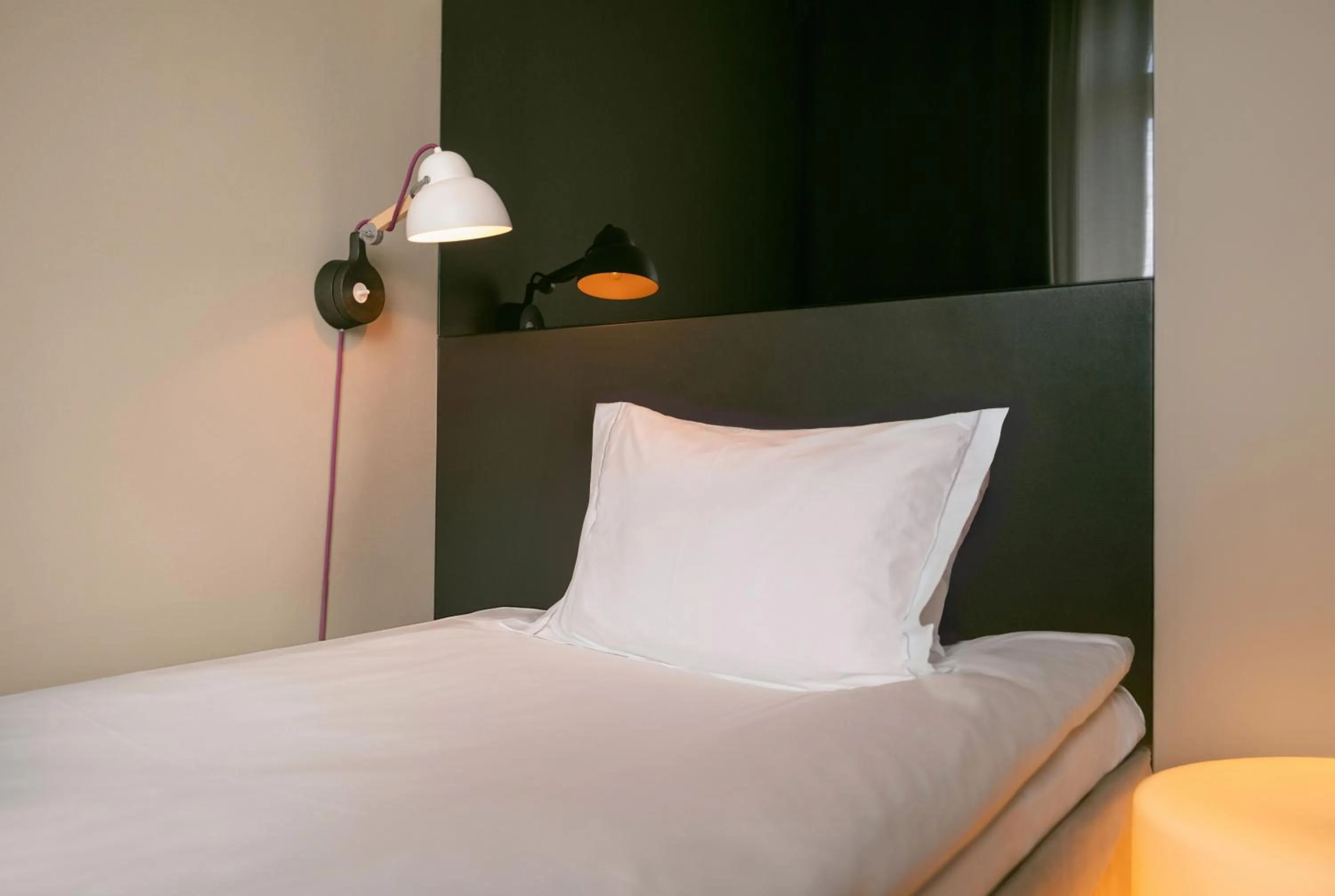 Bed in Nobis Hotel Stockholm, a Member of Design Hotels