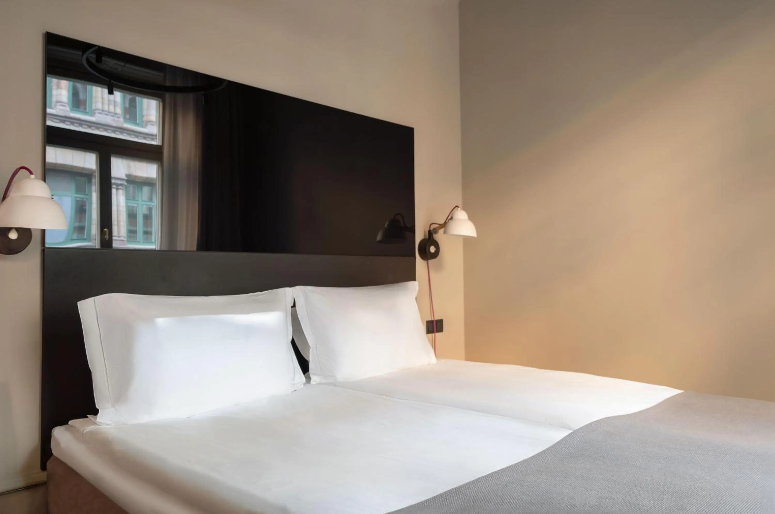 Bed in Nobis Hotel Stockholm, a Member of Design Hotels
