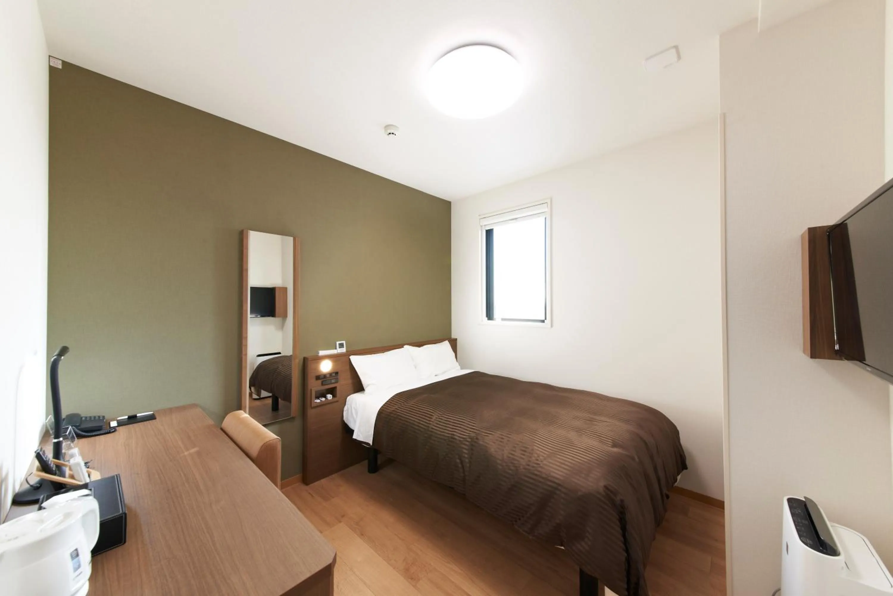 Bed in Hotel Sun Clover Koshigaya Eki mae