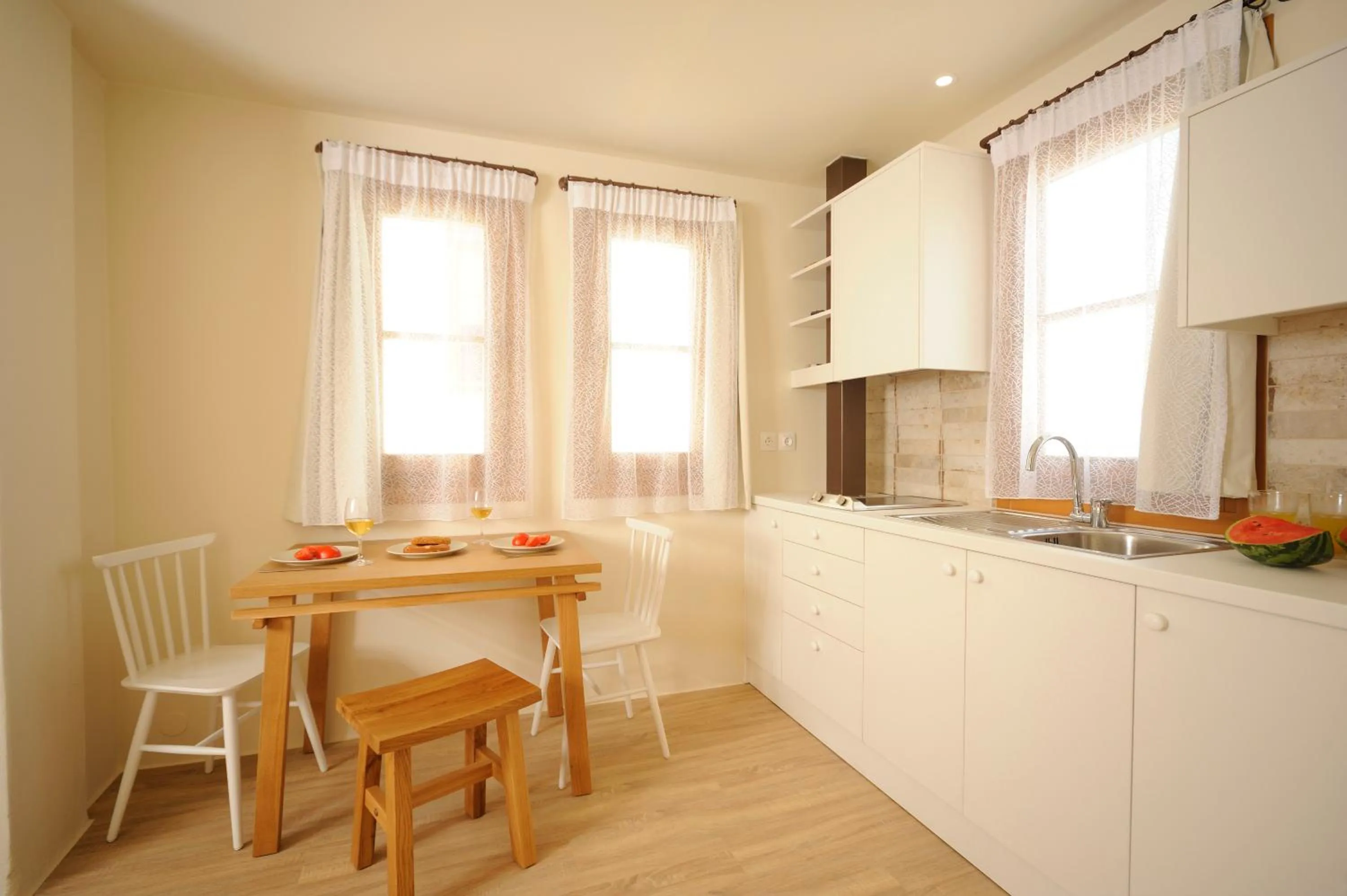 Kitchen or kitchenette in Veranda Rossa Suites