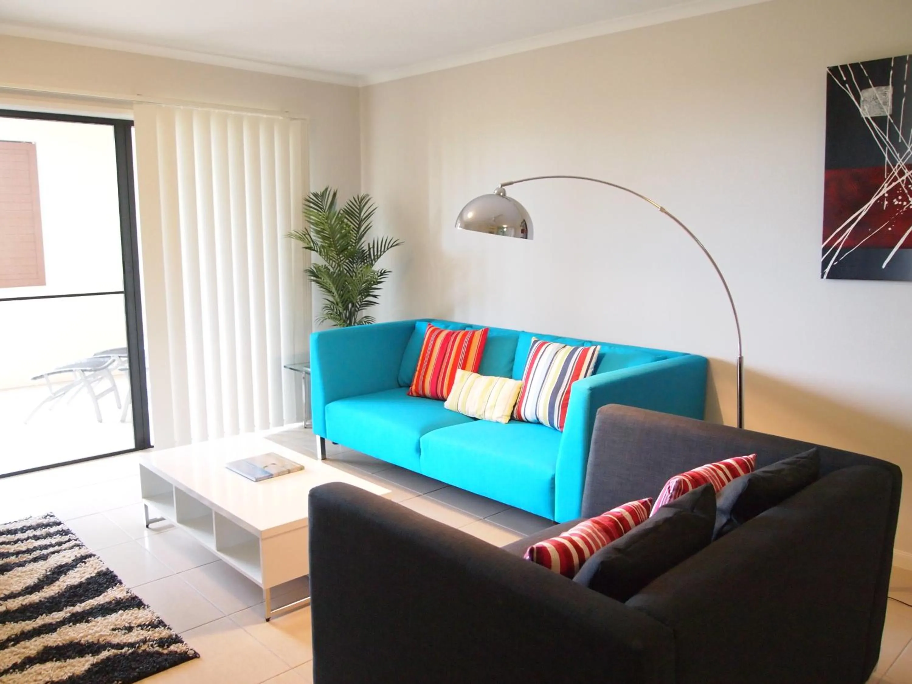 Seating area in Edge Apartments Cairns