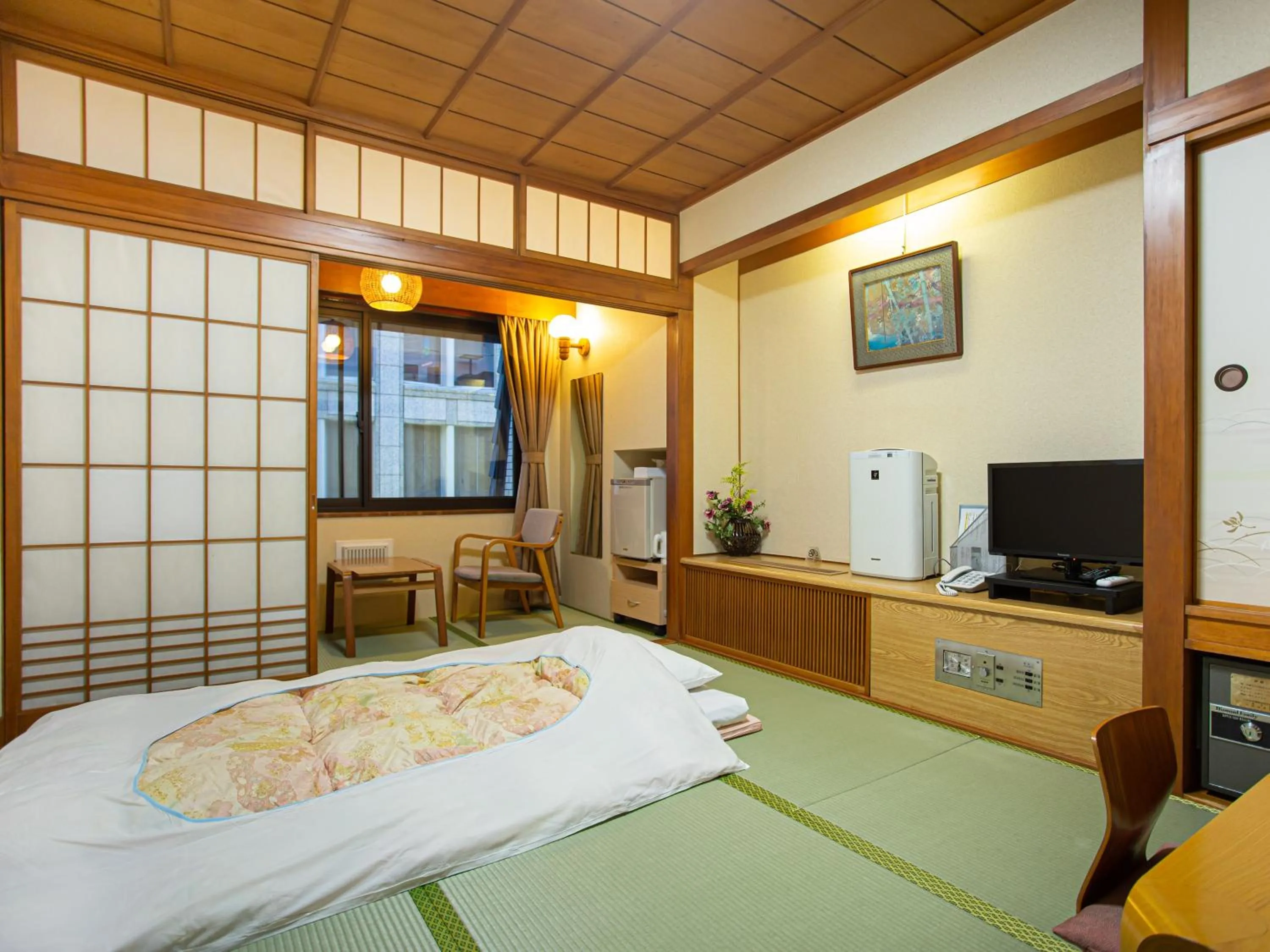 Photo of the whole room, Bed in Kaneyoshi Ryokan