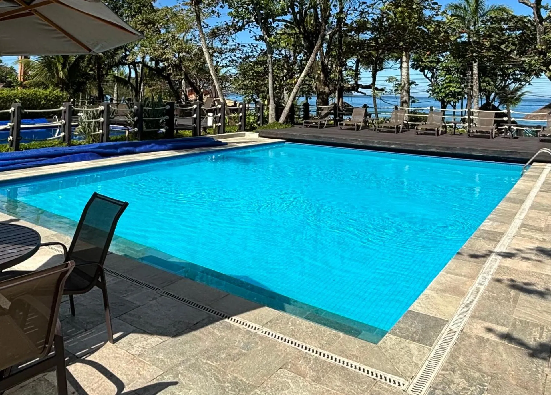 Pool view in Juquehy - Condomínio de Frente para o Mar - Piscina Aquecida - Quadra de Tenis