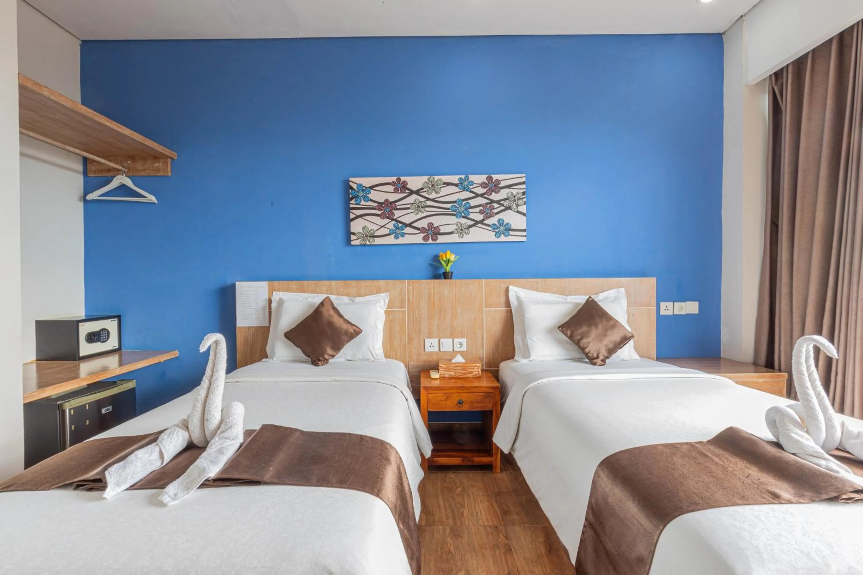 Bed in The Tanis Beach Resort Nusa Lembongan