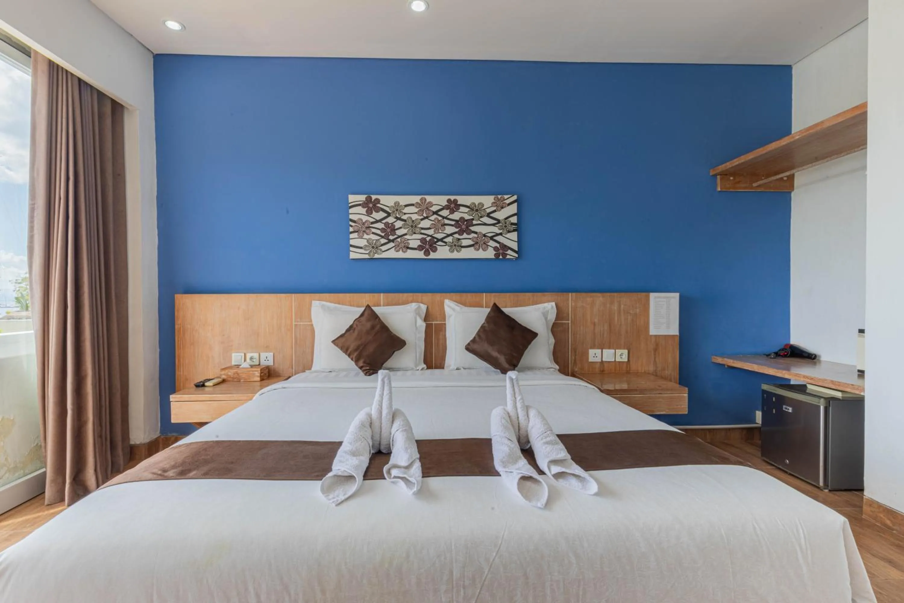 Bed in The Tanis Beach Resort Nusa Lembongan