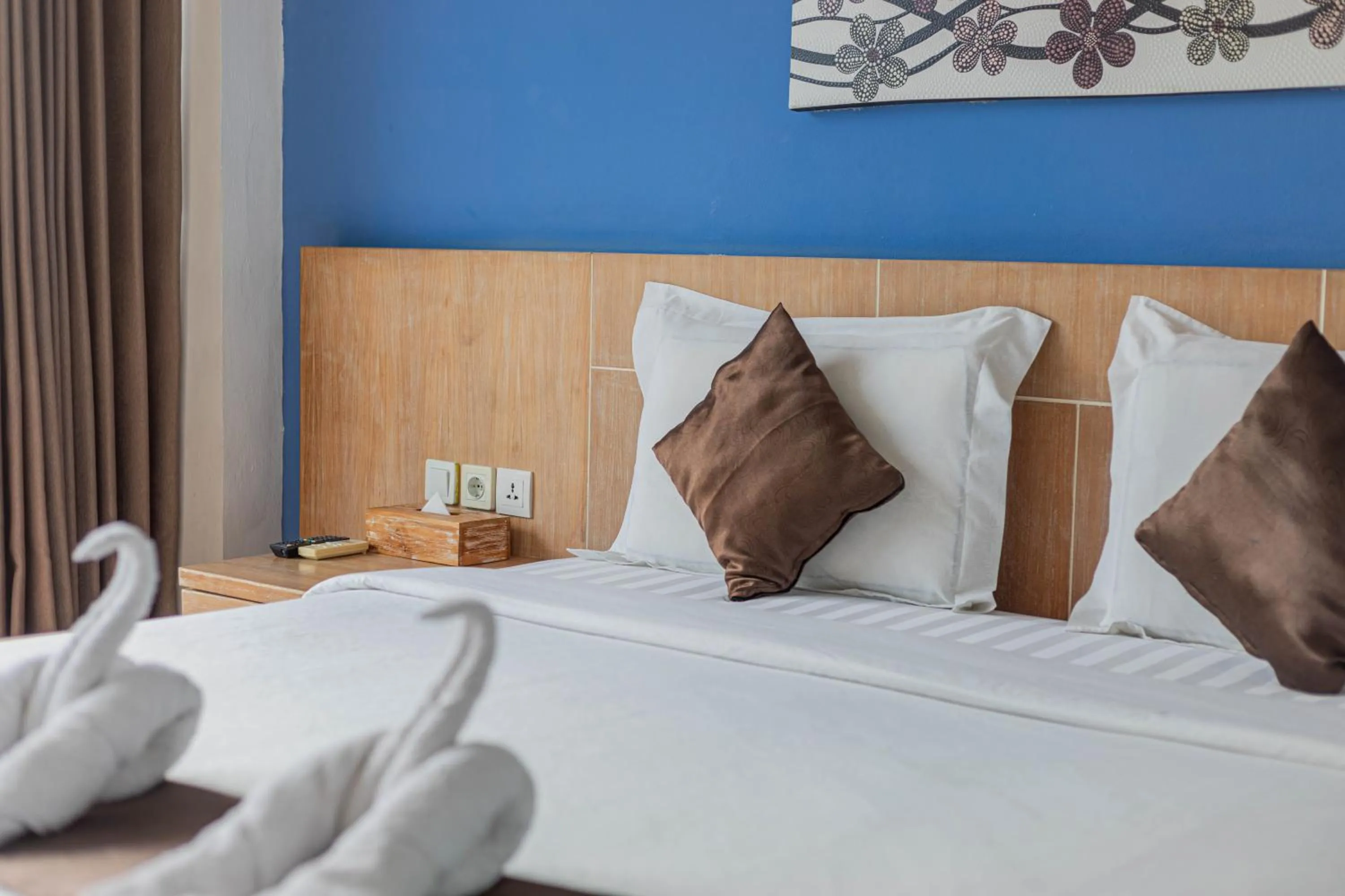 Bed in The Tanis Beach Resort Nusa Lembongan