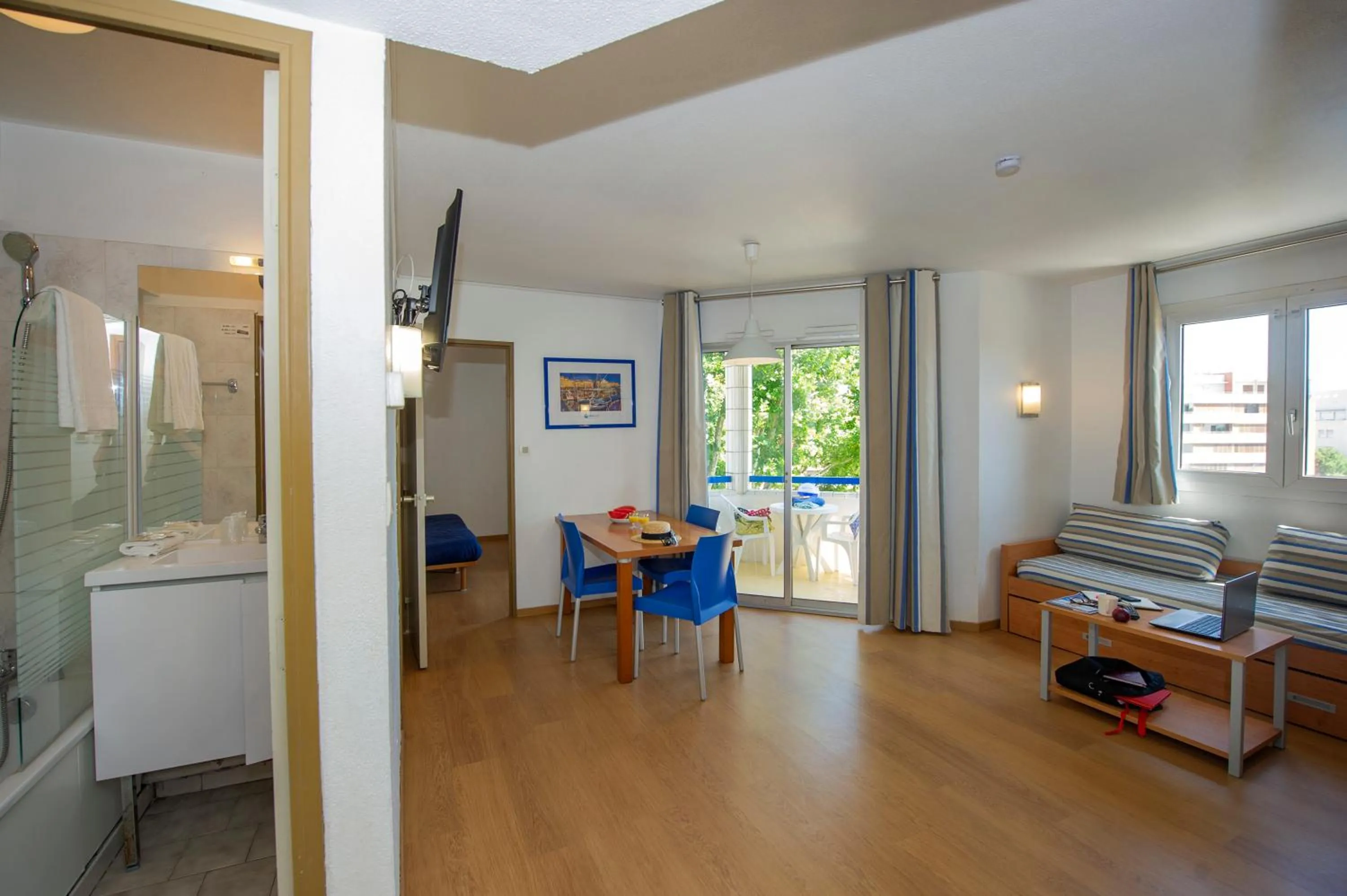 Living room in Appart'hôtel Goélia Sun City