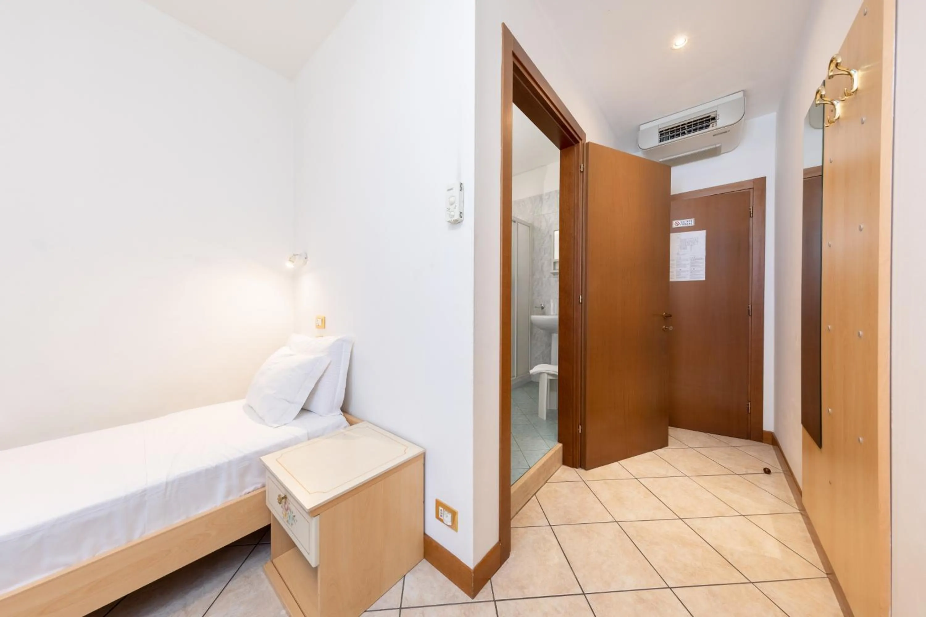 Bed in Hotel New Aurora Venice