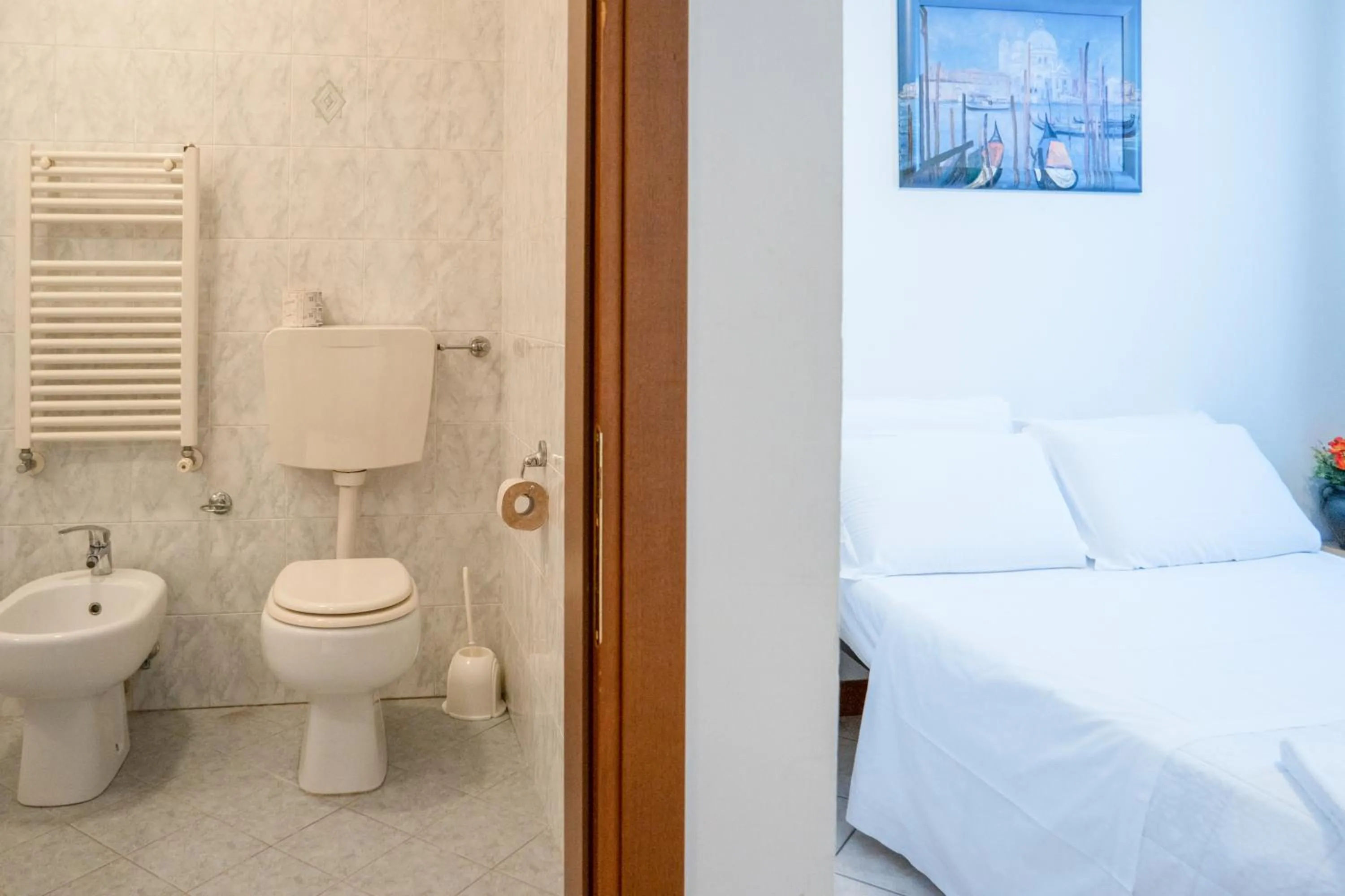 Bed in Hotel New Aurora Venice