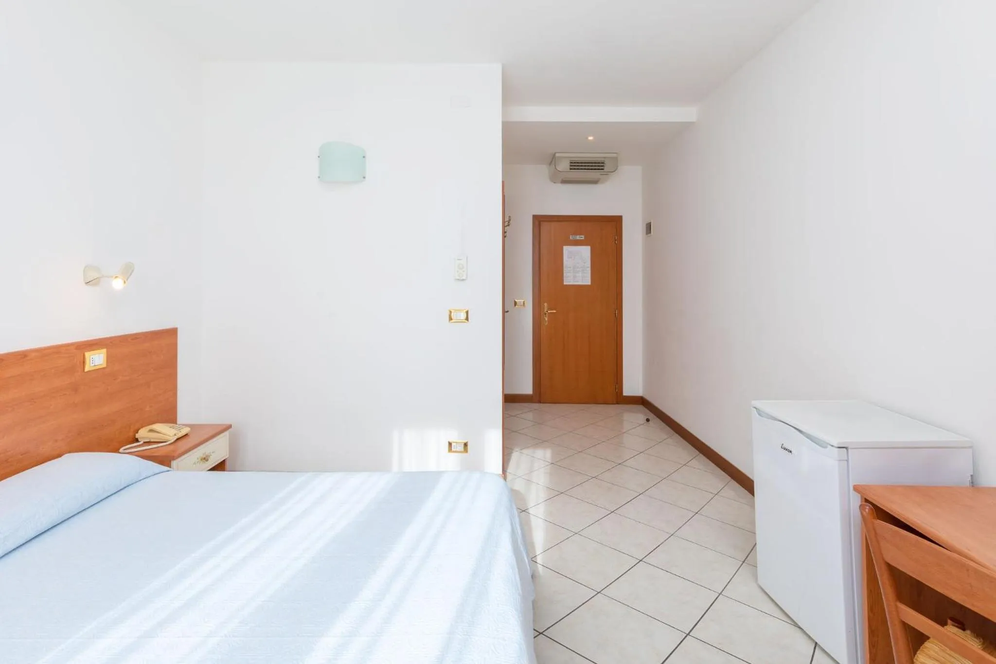 Bed in Hotel New Aurora Venice