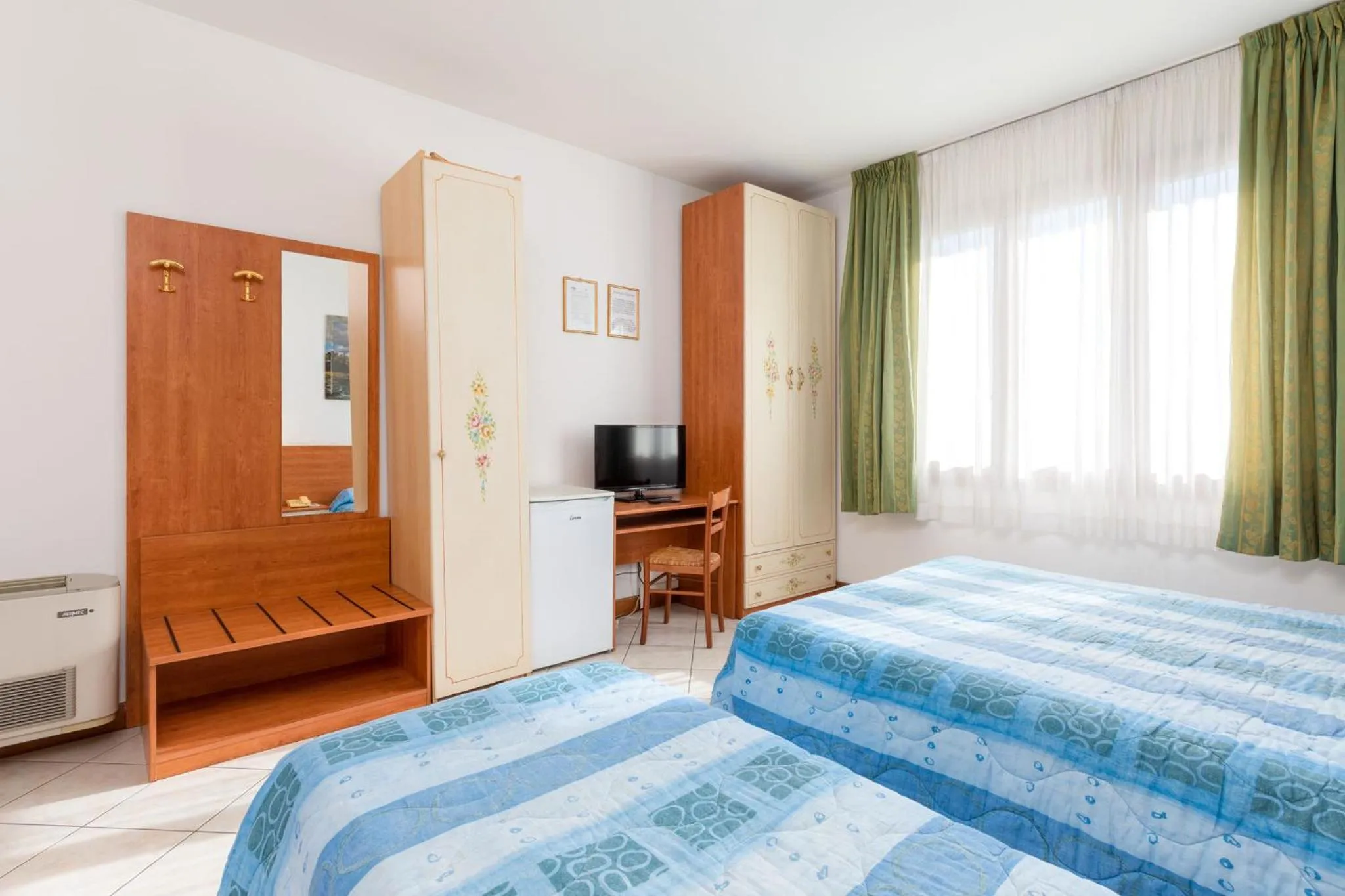 Bed in Hotel New Aurora Venice