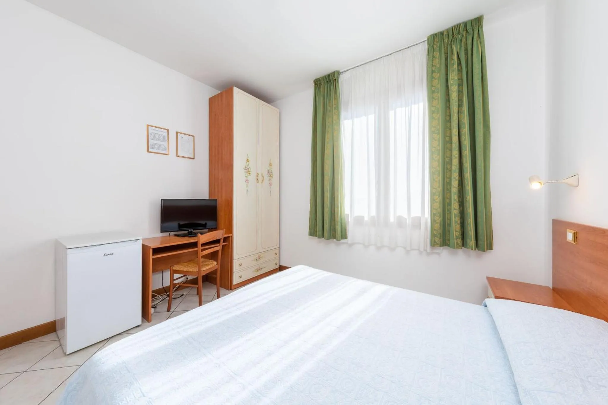 Bed in Hotel New Aurora Venice