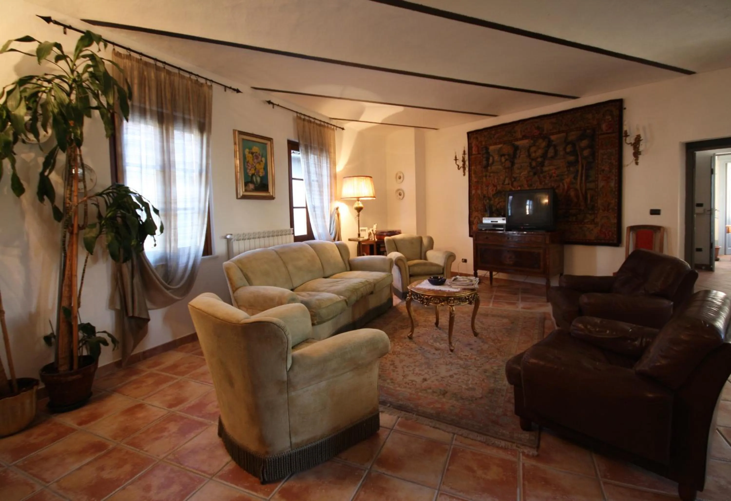 Communal lounge/ TV room in Relais San Desiderio