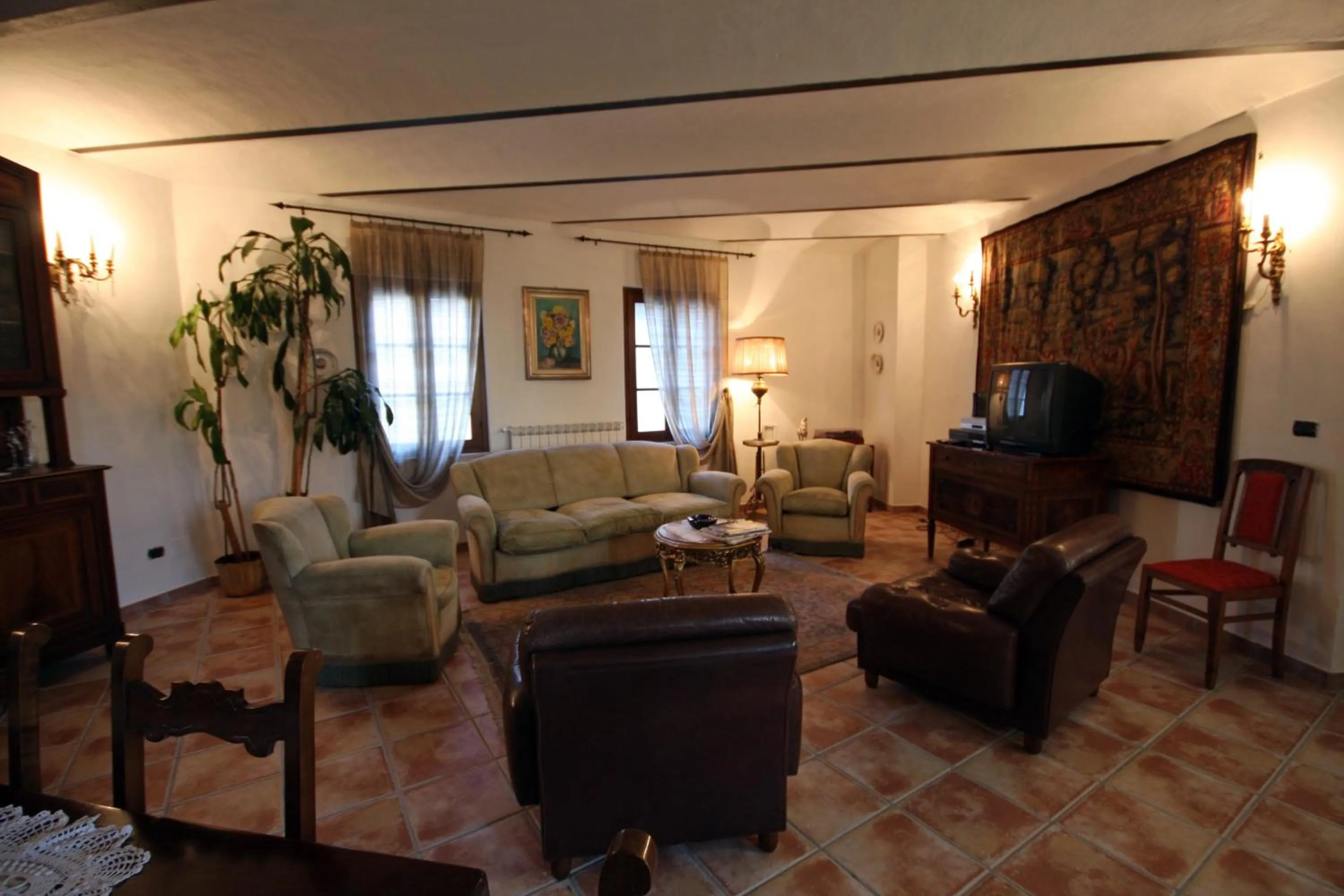 Communal lounge/ TV room in Relais San Desiderio