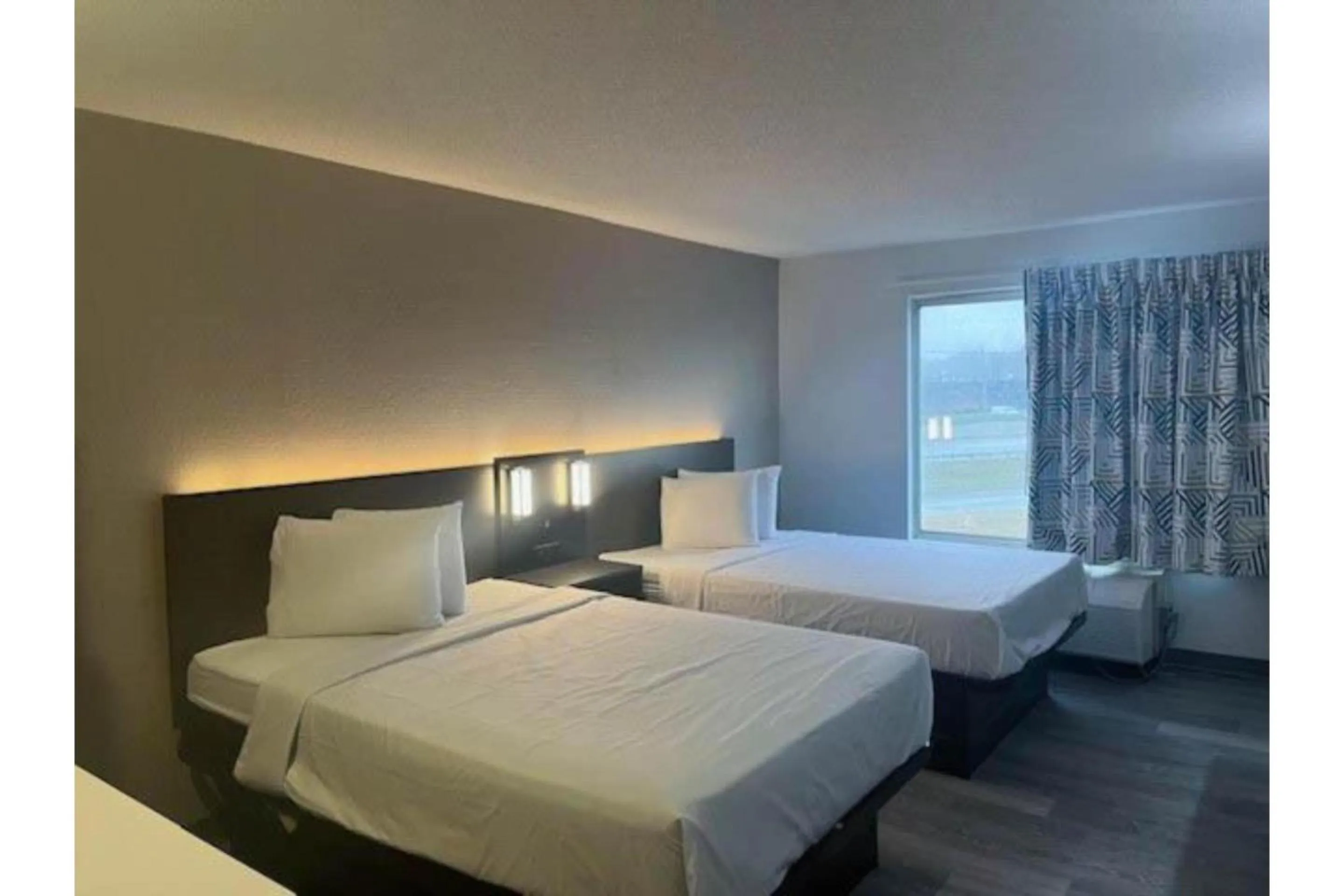 Bedroom, Bed in Studio 6 Suites Norcross, GA