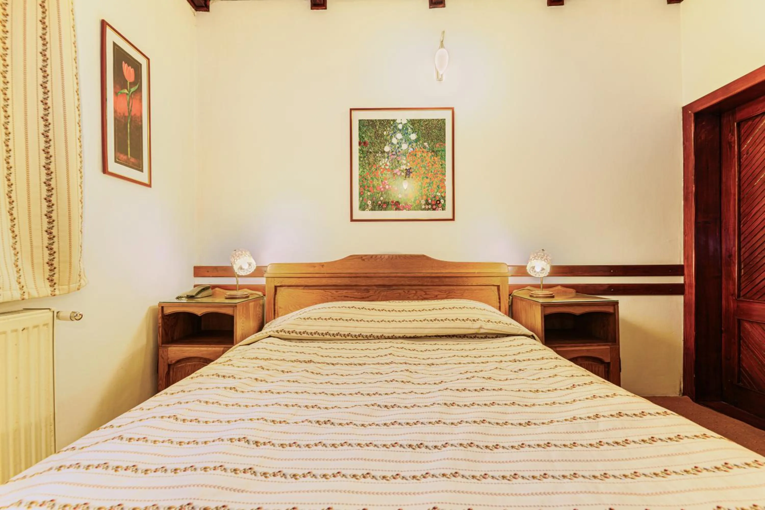 Bed in Pension Casa Bradul