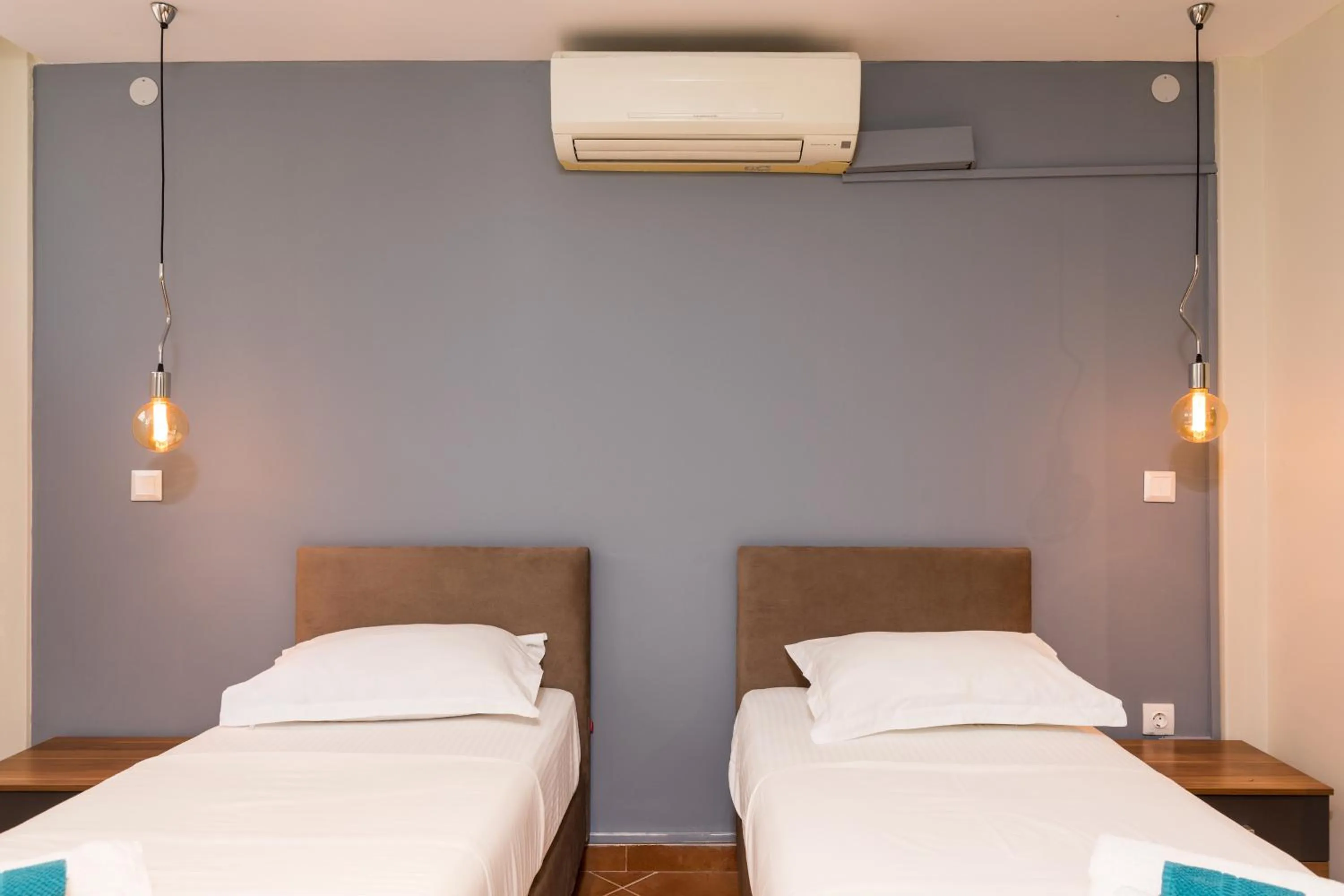 Bed in Mon-Repo Suites