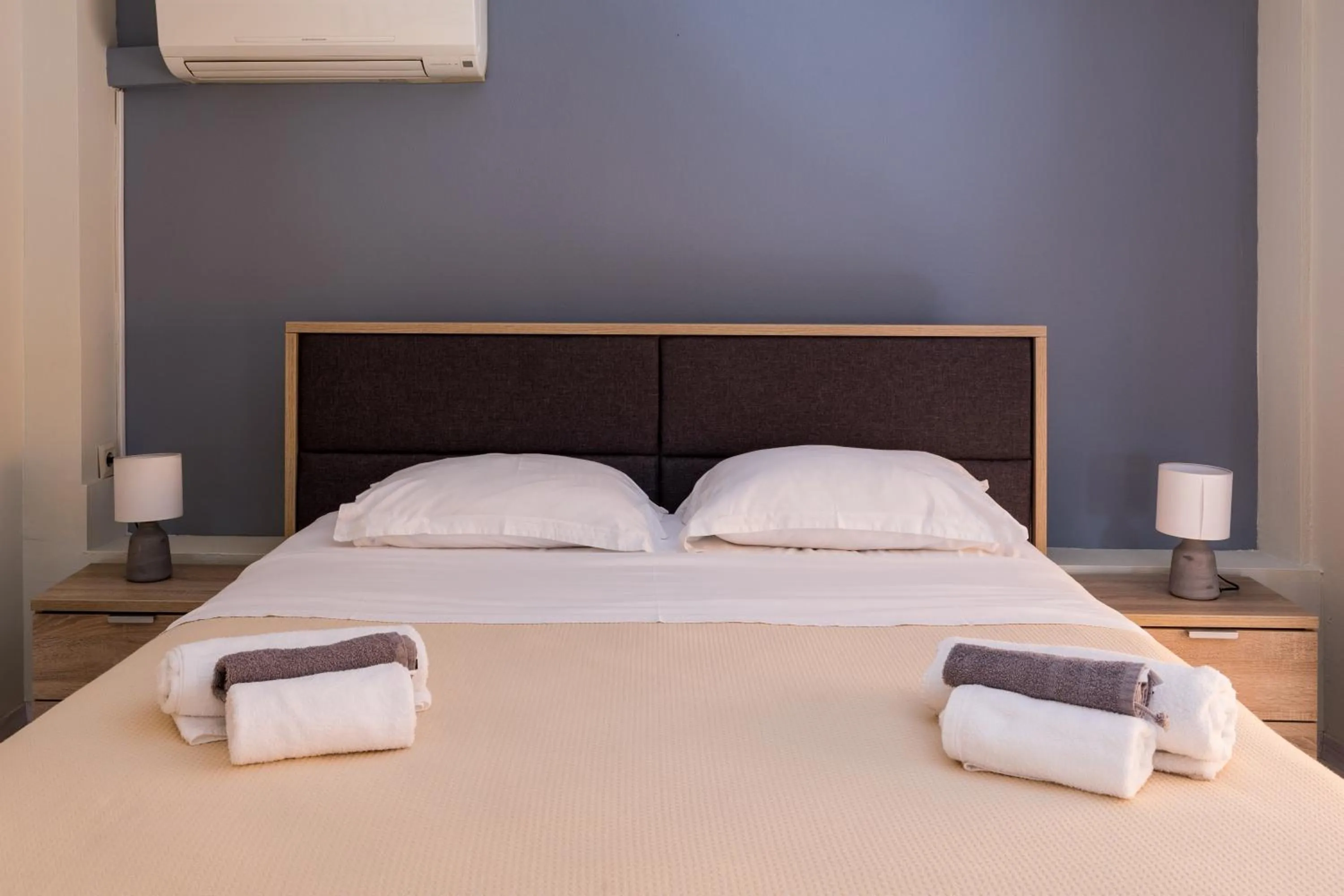 Bed in Mon-Repo Suites