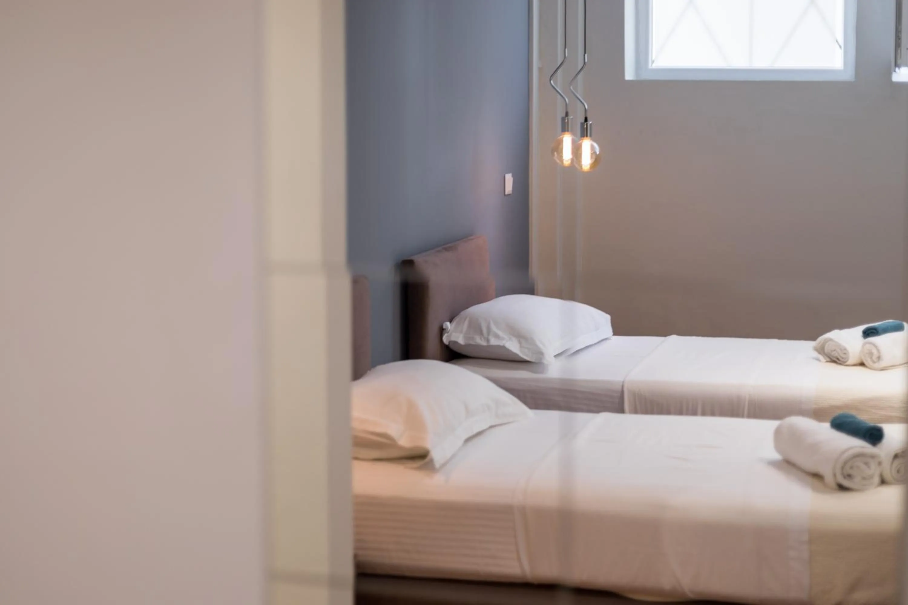 Bed in Mon-Repo Suites