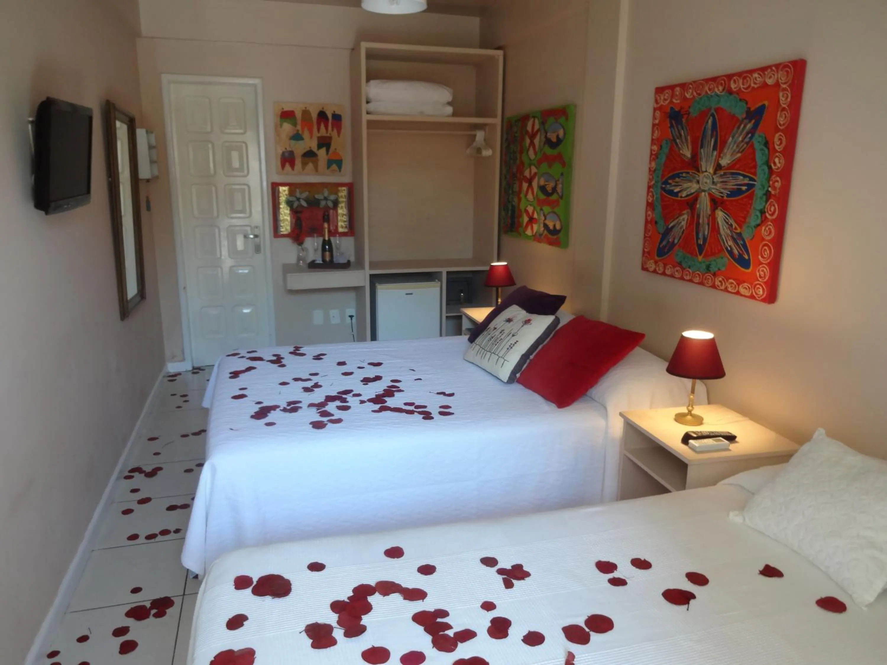 Bed in Pousada Via Brasil