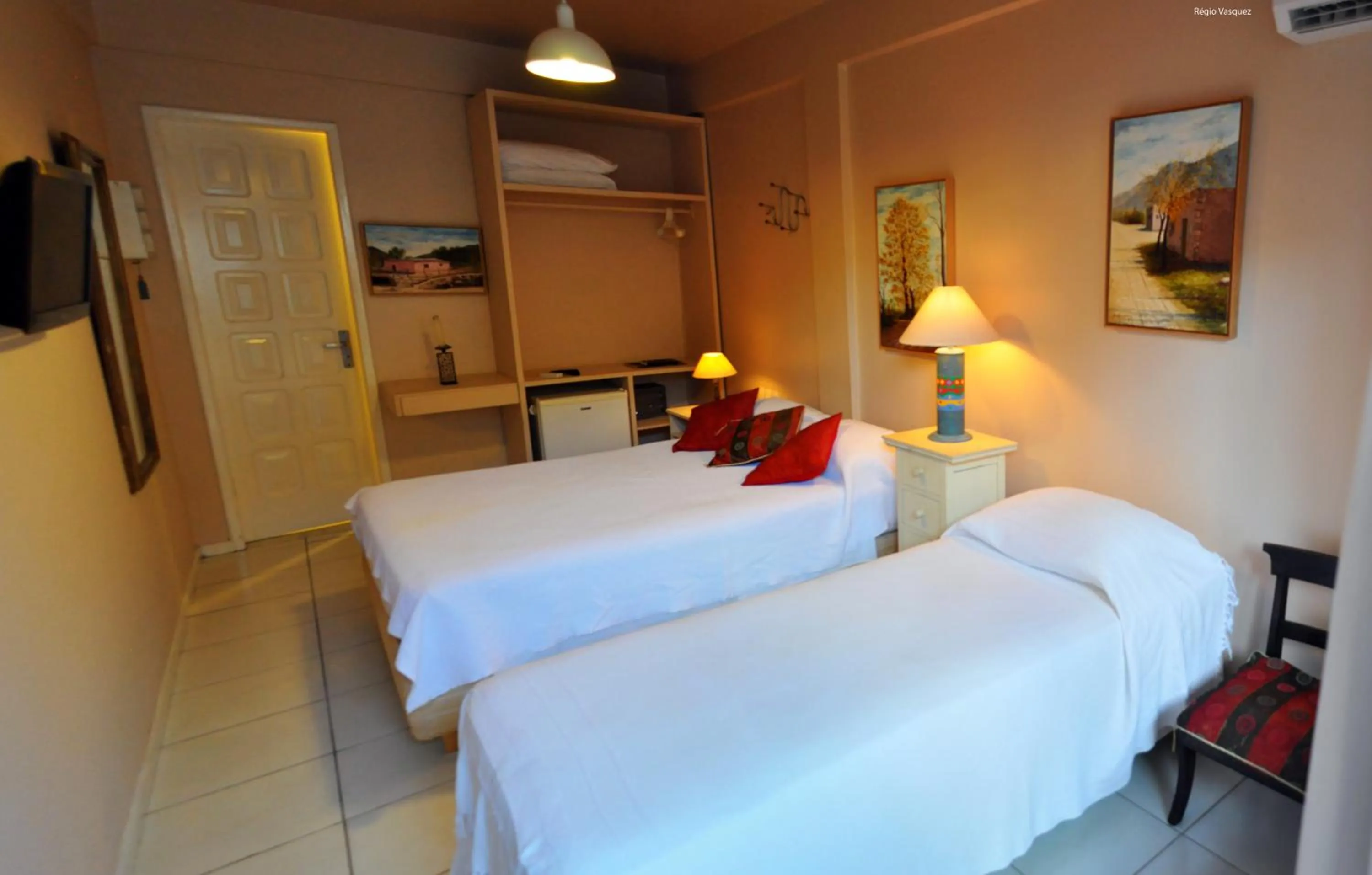 Bed in Pousada Via Brasil