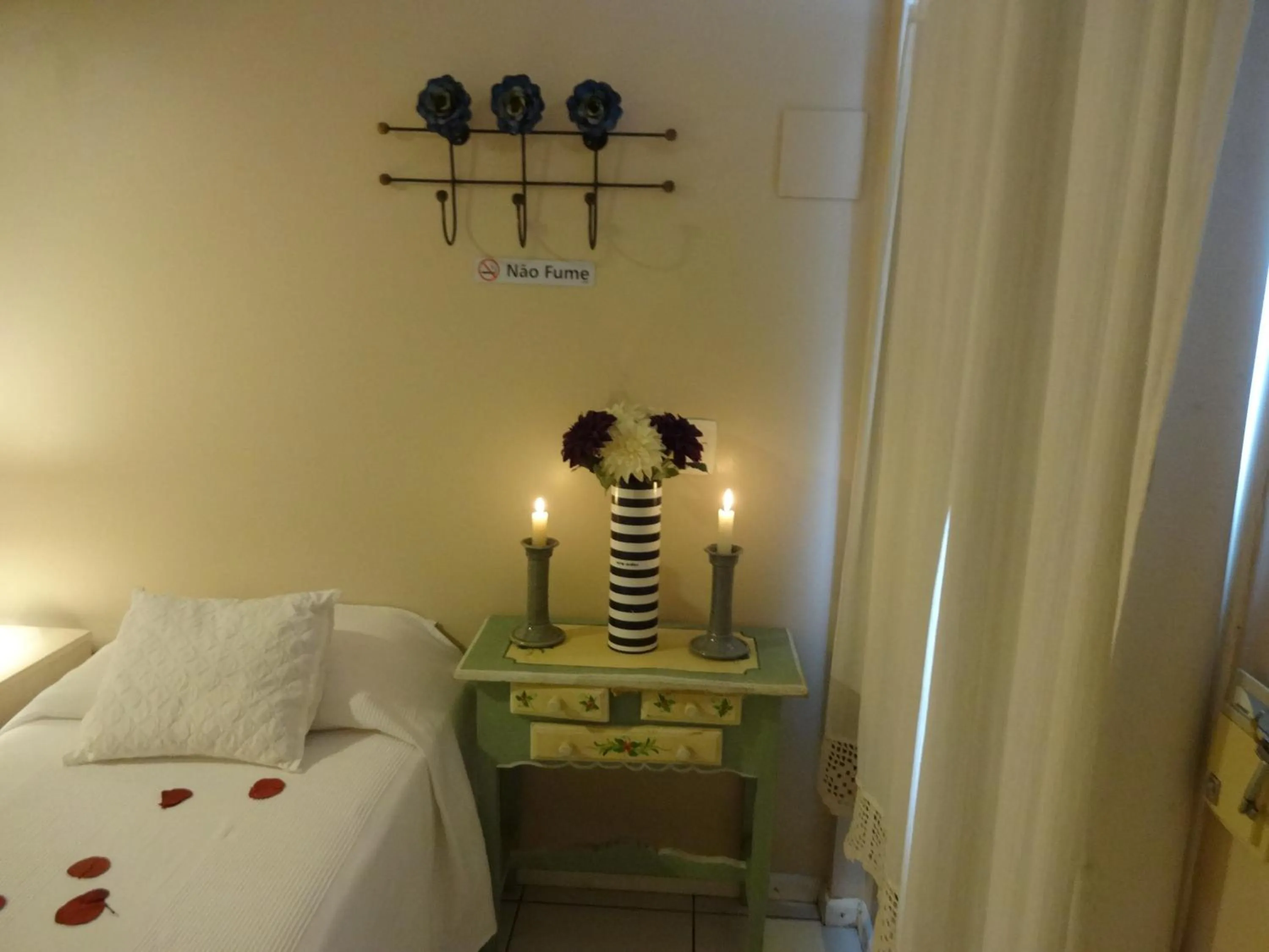 Bed in Pousada Via Brasil