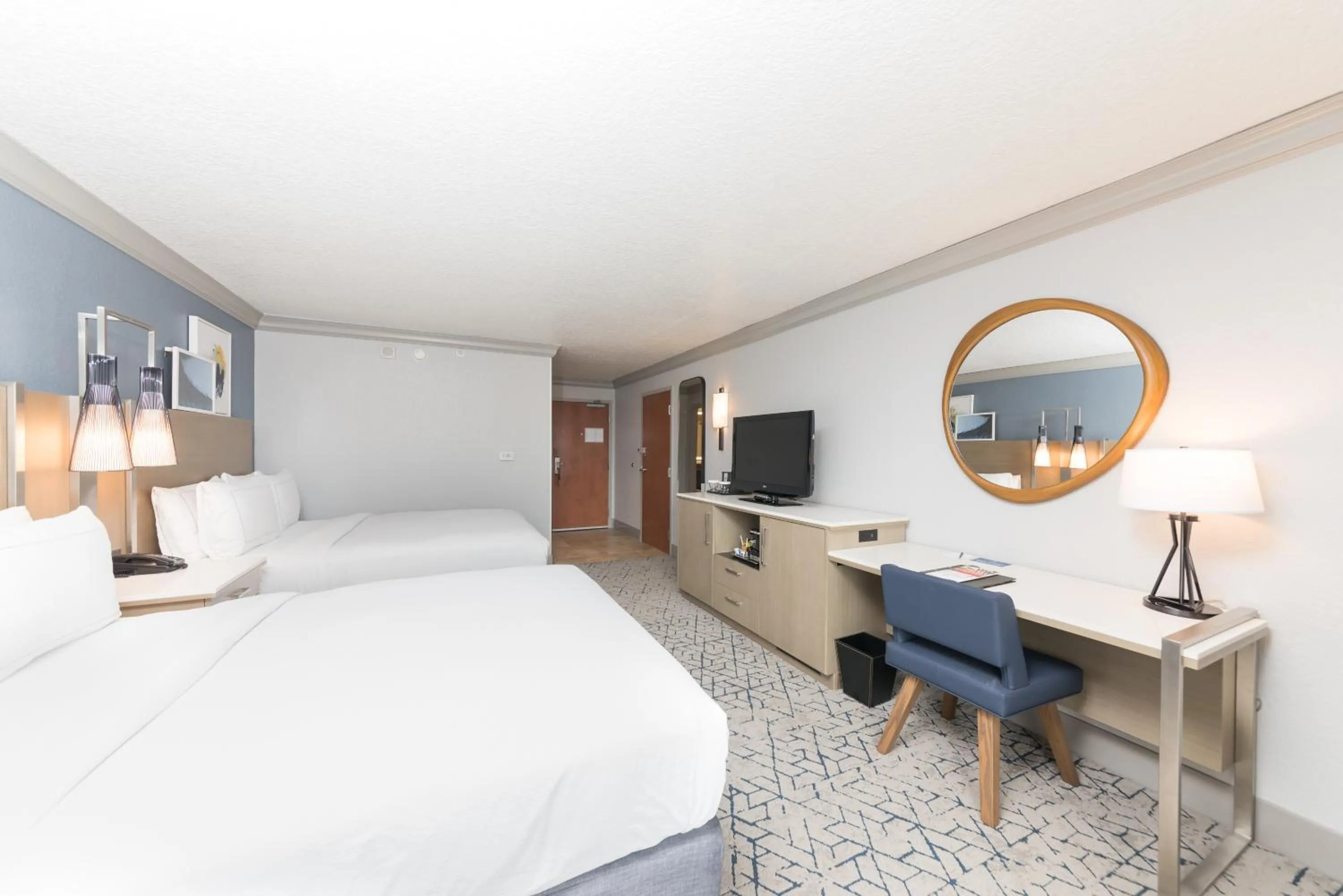 Bed in DoubleTree Suites by Hilton Melbourne Beach Oceanfront