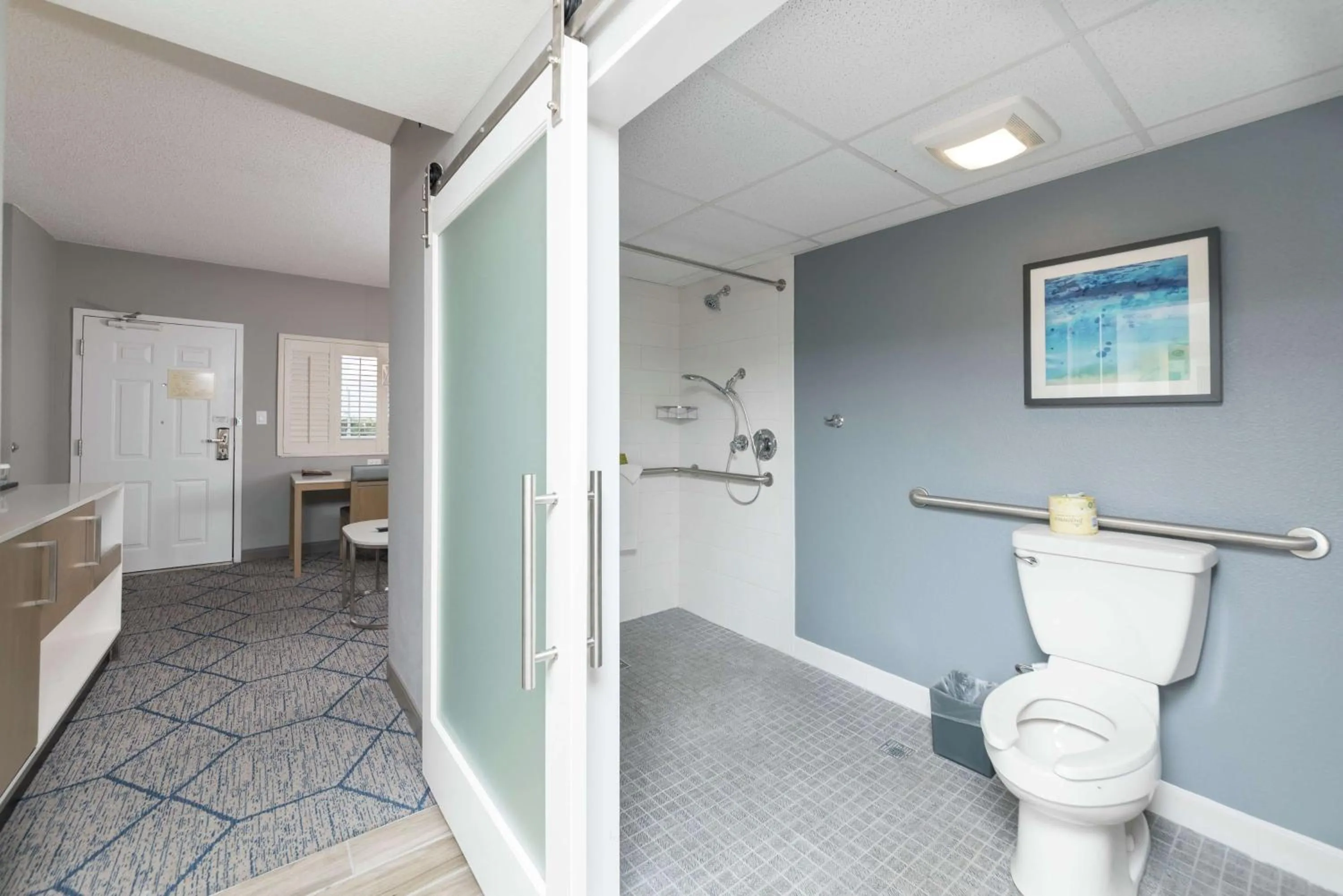 Bed in DoubleTree Suites by Hilton Melbourne Beach Oceanfront