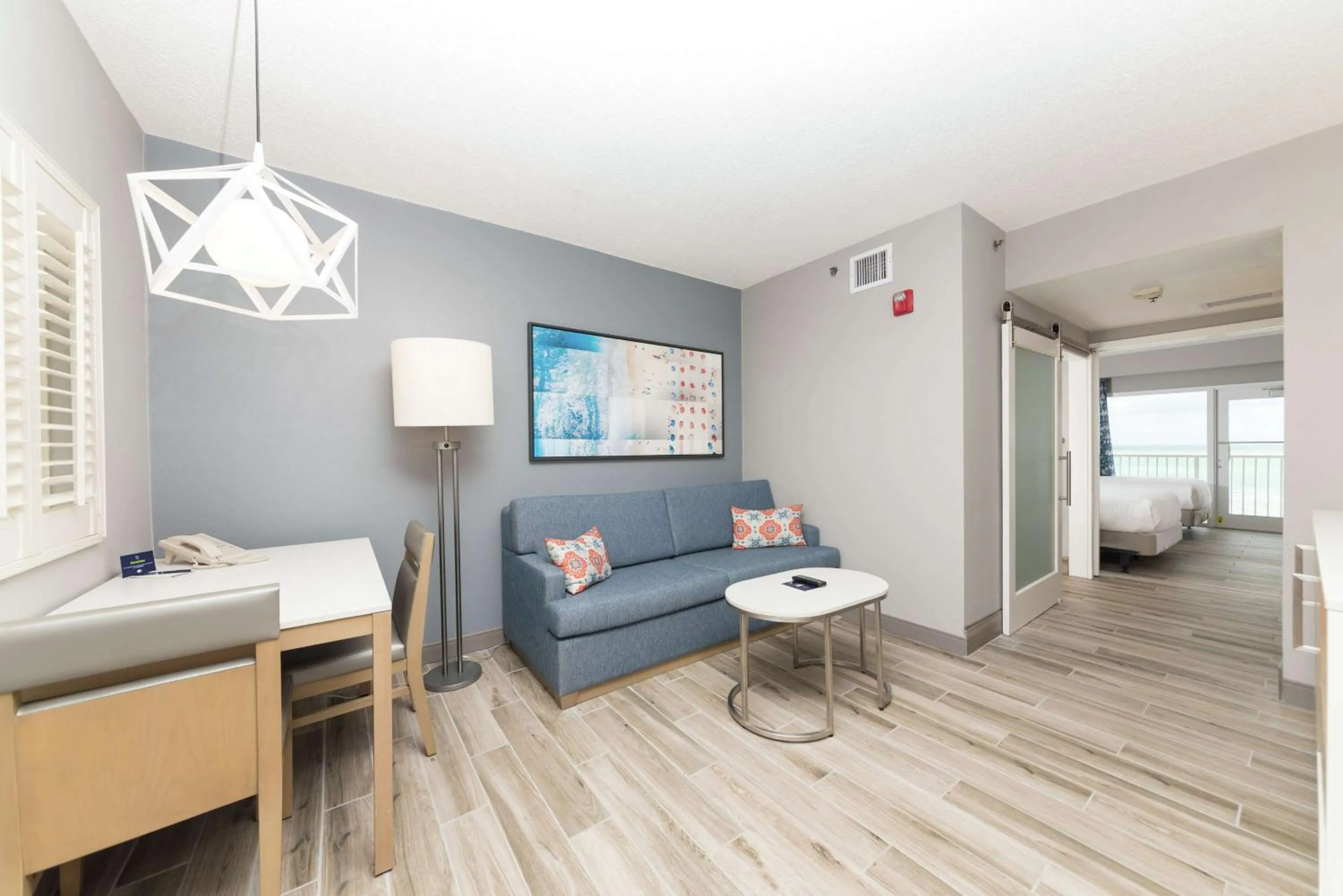 Bed in DoubleTree Suites by Hilton Melbourne Beach Oceanfront