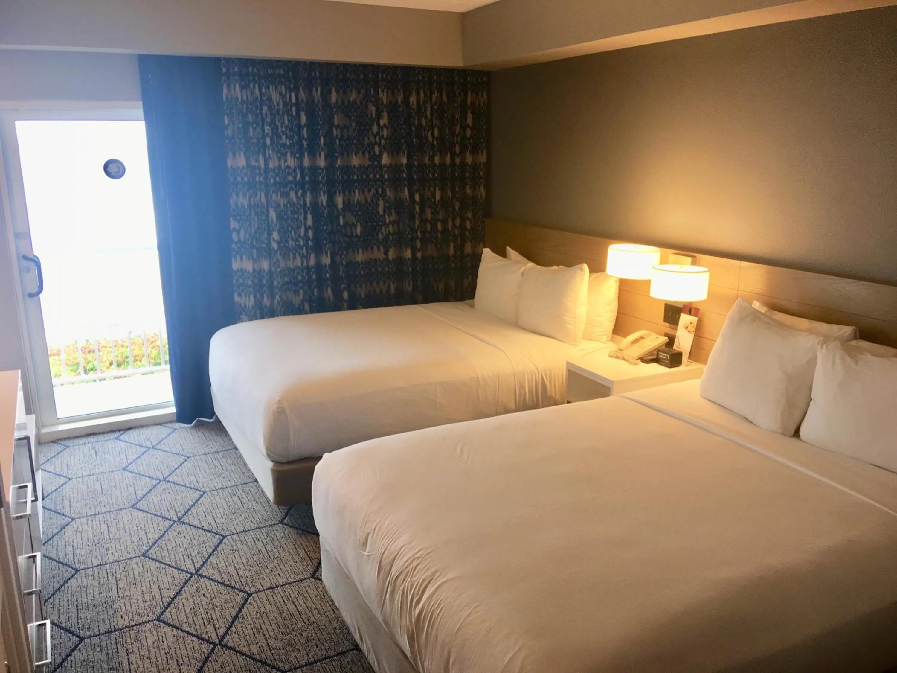 Bed in DoubleTree Suites by Hilton Melbourne Beach Oceanfront