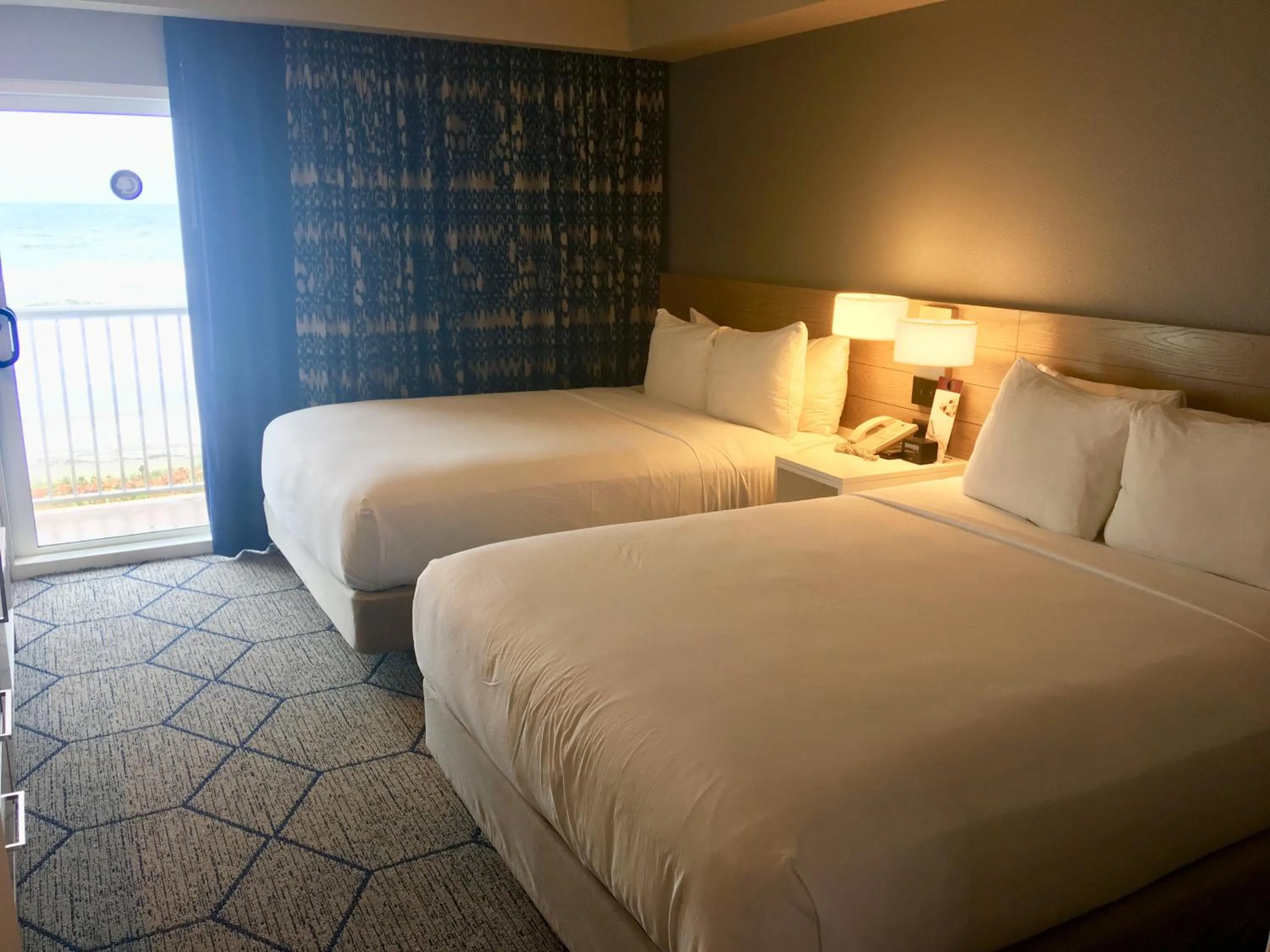 Bed in DoubleTree Suites by Hilton Melbourne Beach Oceanfront