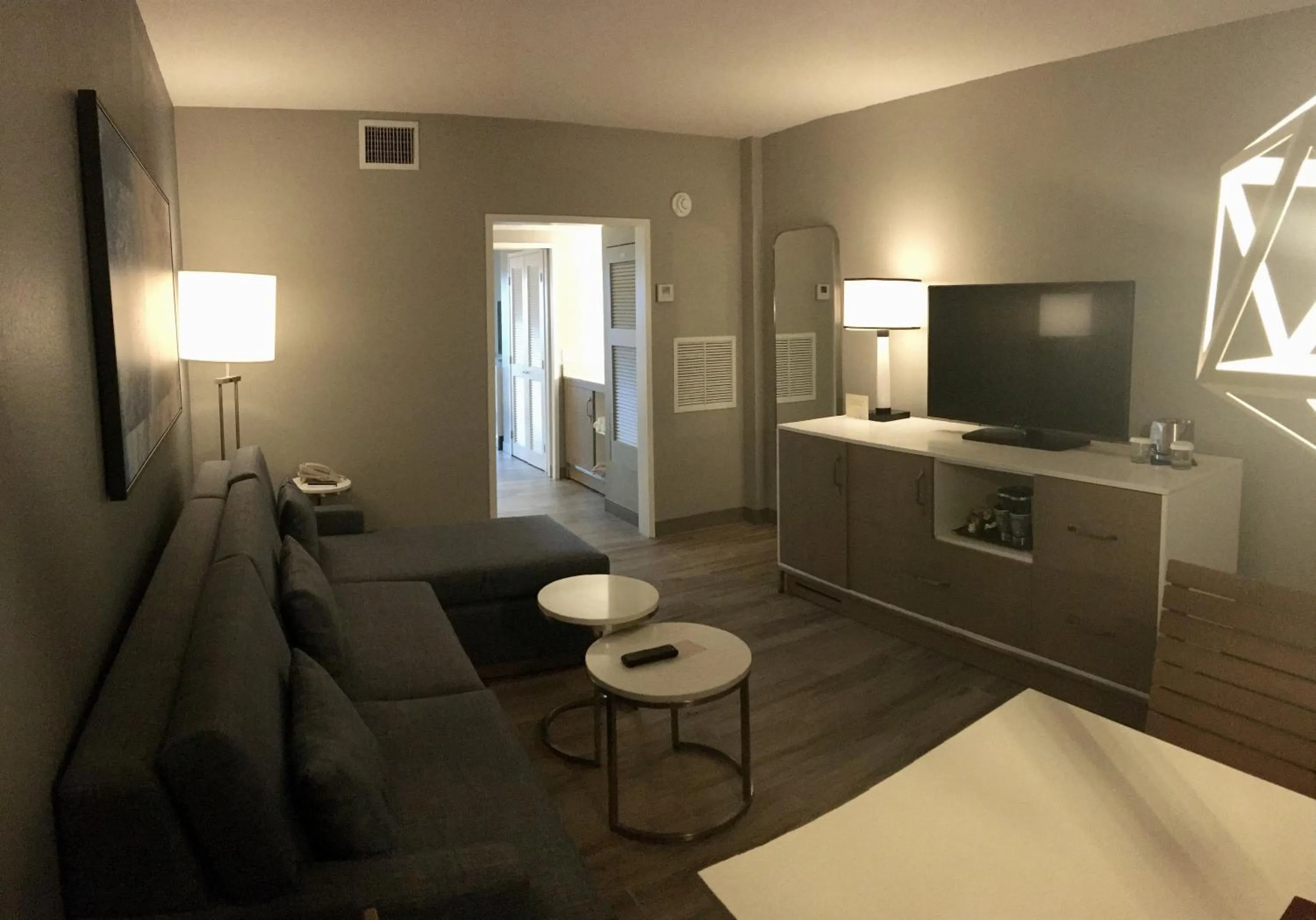 Communal lounge/ TV room, Bed in DoubleTree Suites by Hilton Melbourne Beach Oceanfront