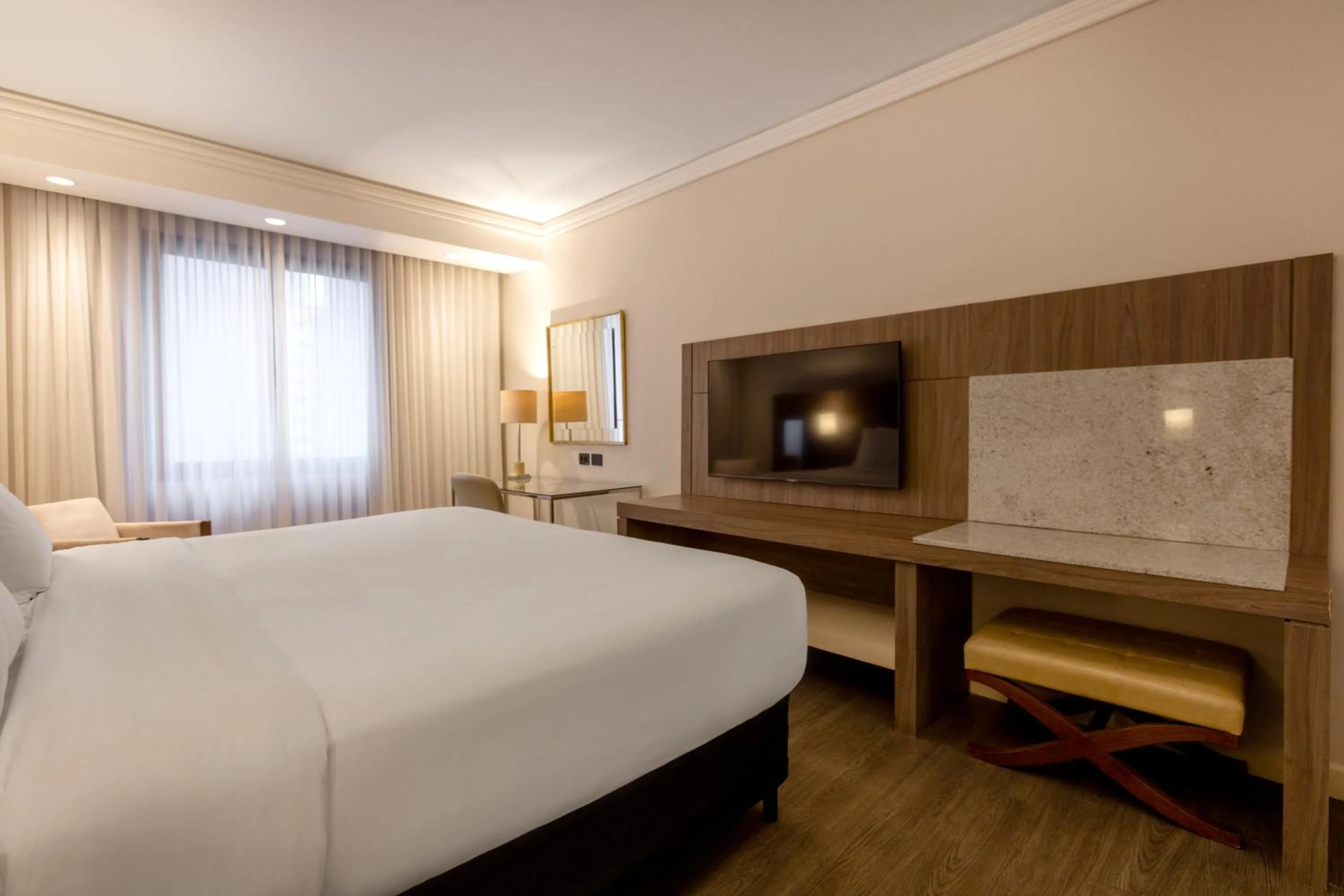 Bed in Grand Mercure Curitiba Rayon