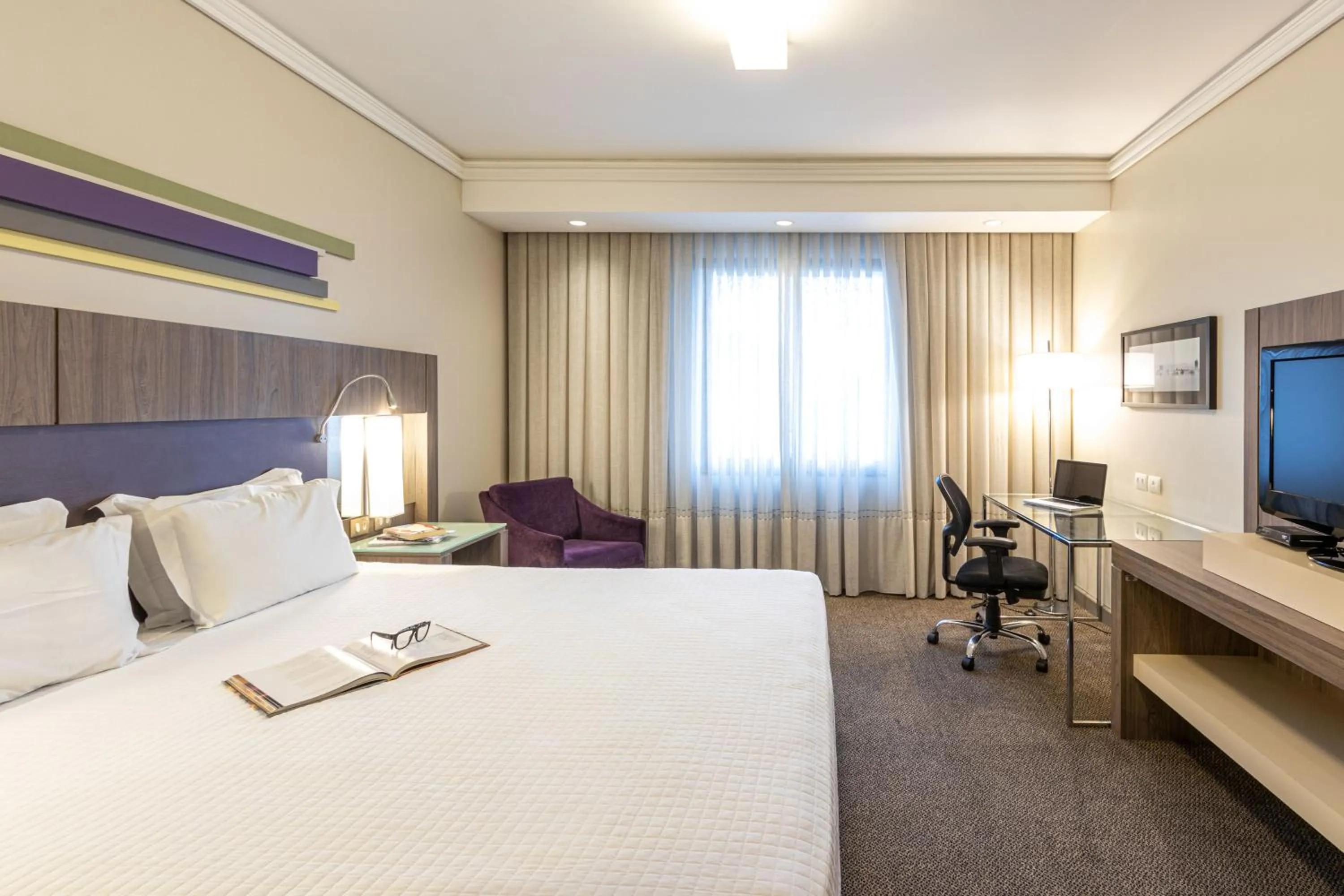 Bed in Grand Mercure Curitiba Rayon