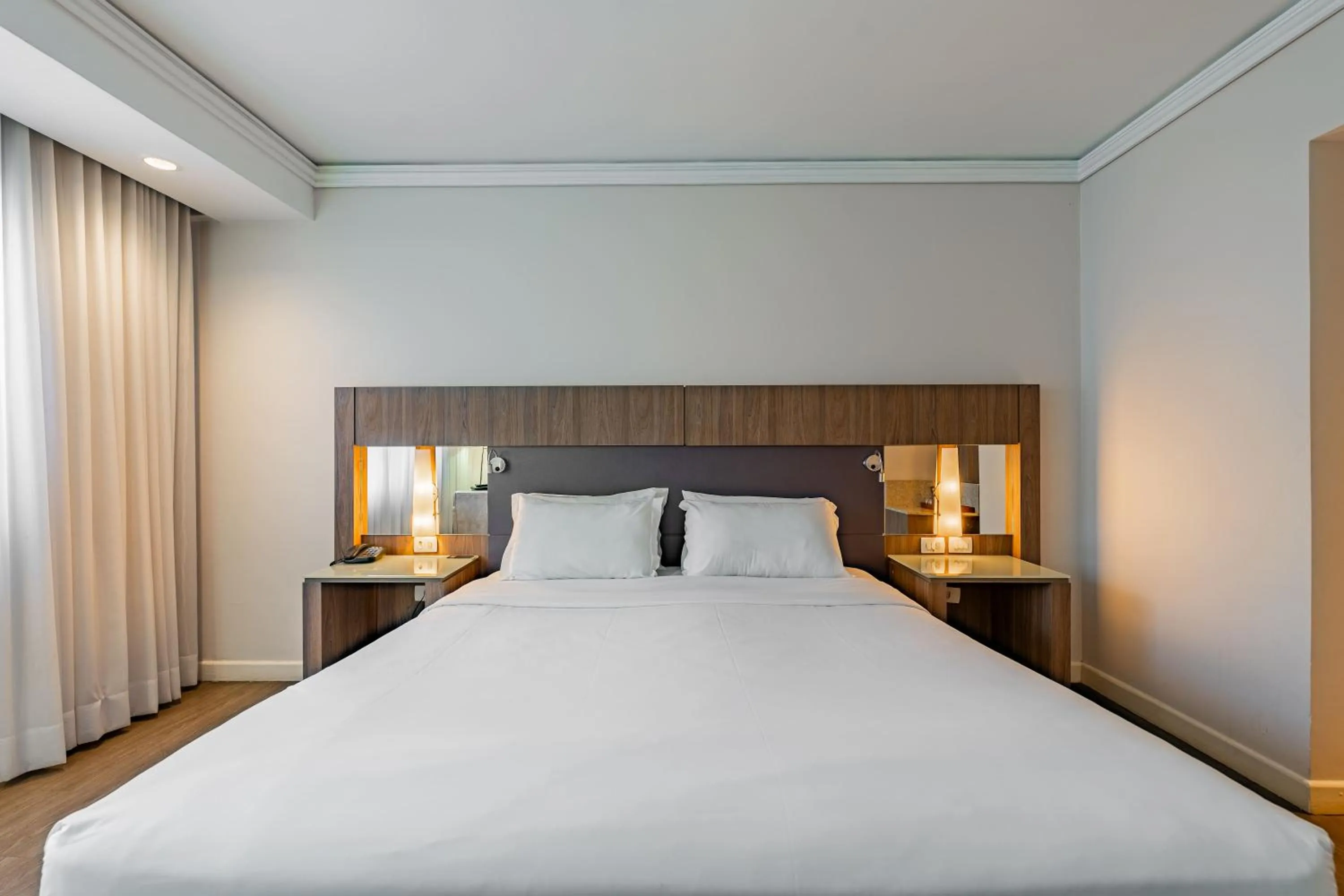 Bed in Grand Mercure Curitiba Rayon