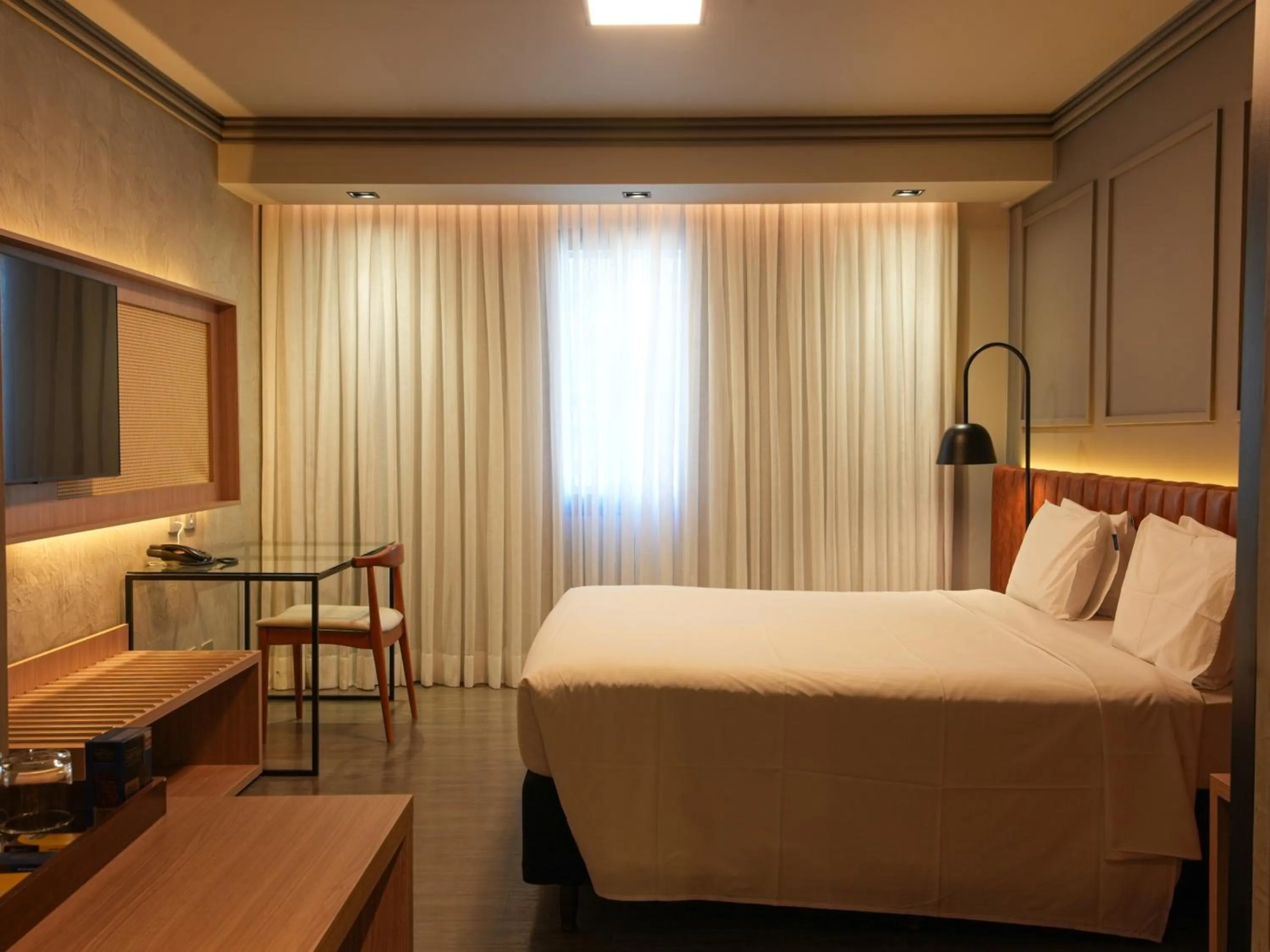 Bed in Grand Mercure Curitiba Rayon