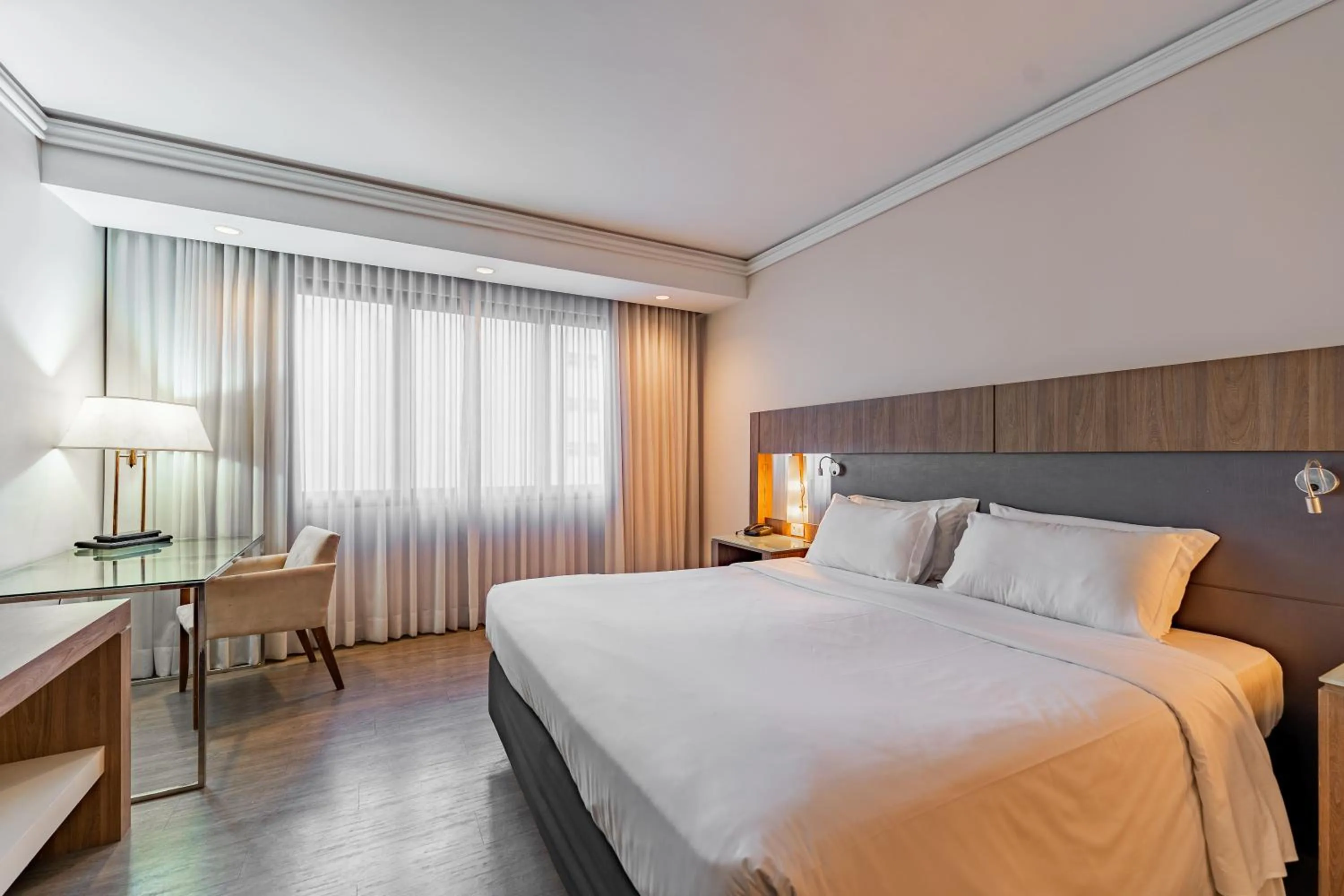 Bed in Grand Mercure Curitiba Rayon