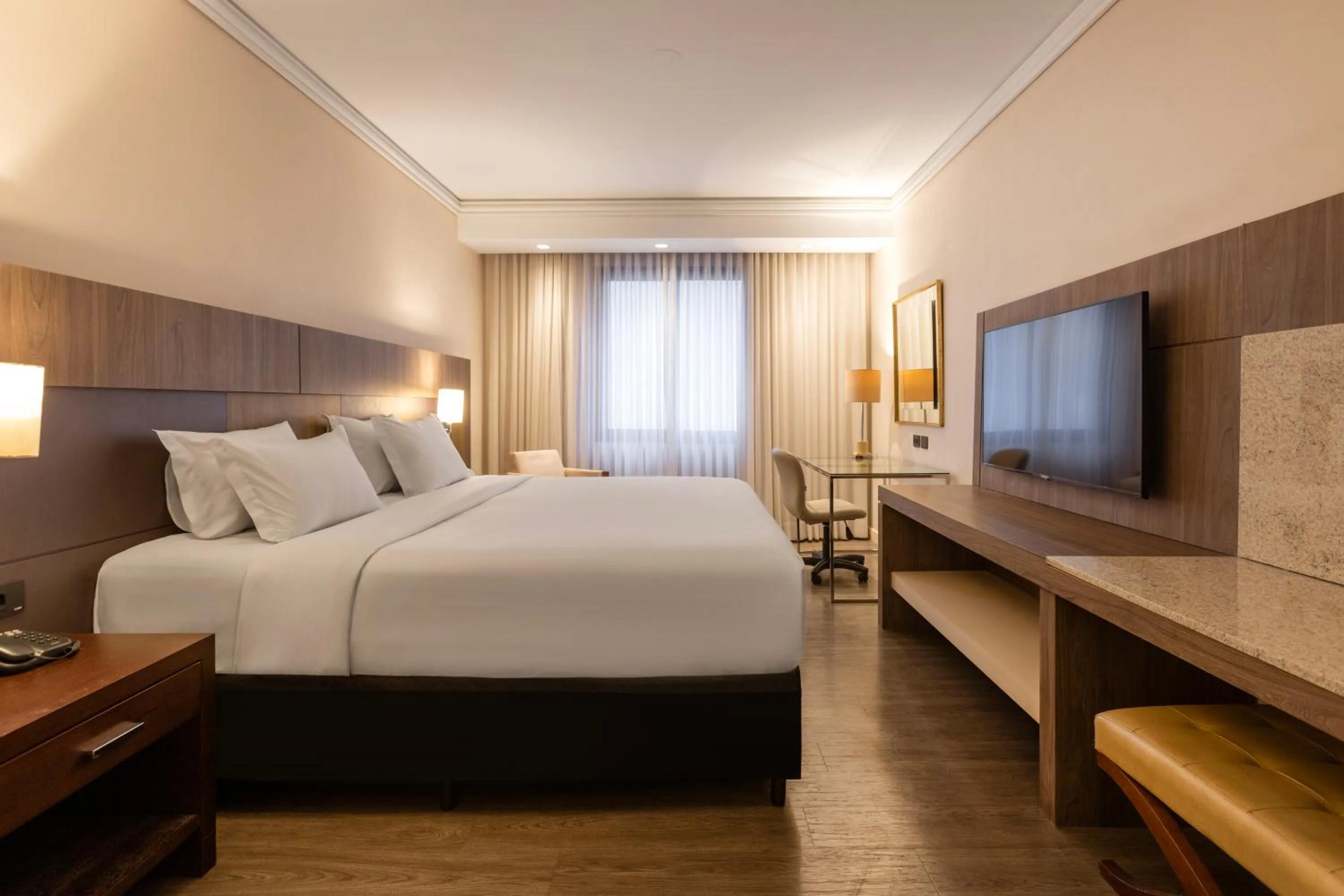 Bed in Grand Mercure Curitiba Rayon