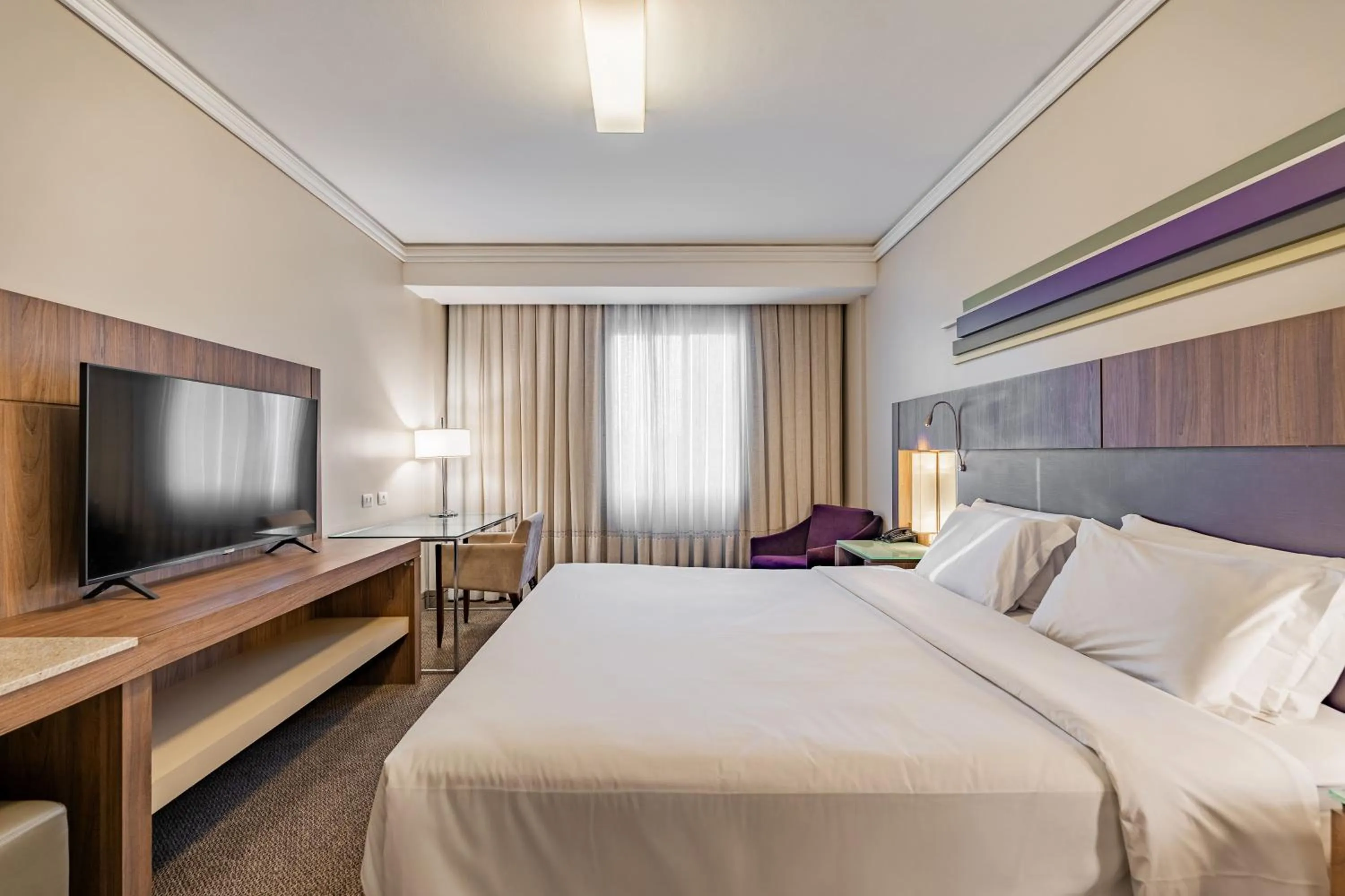 Bed in Grand Mercure Curitiba Rayon