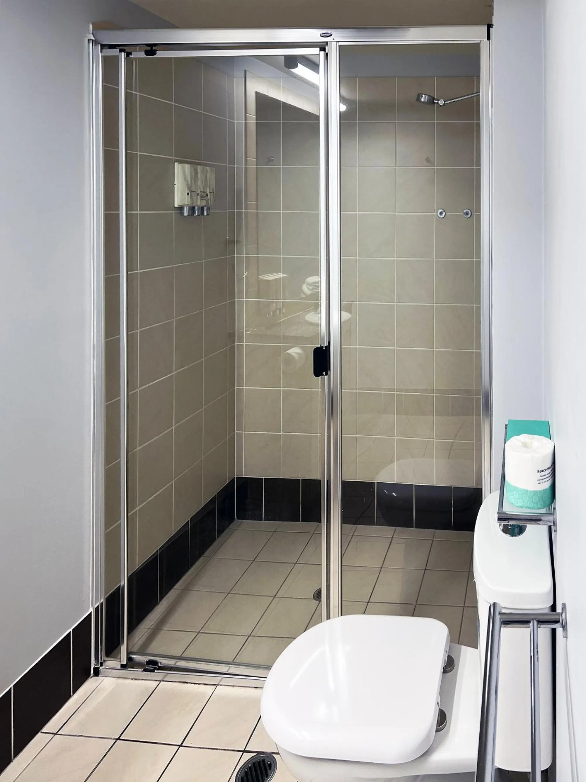 Bathroom in Caloundra Central Apartment Hotel Official