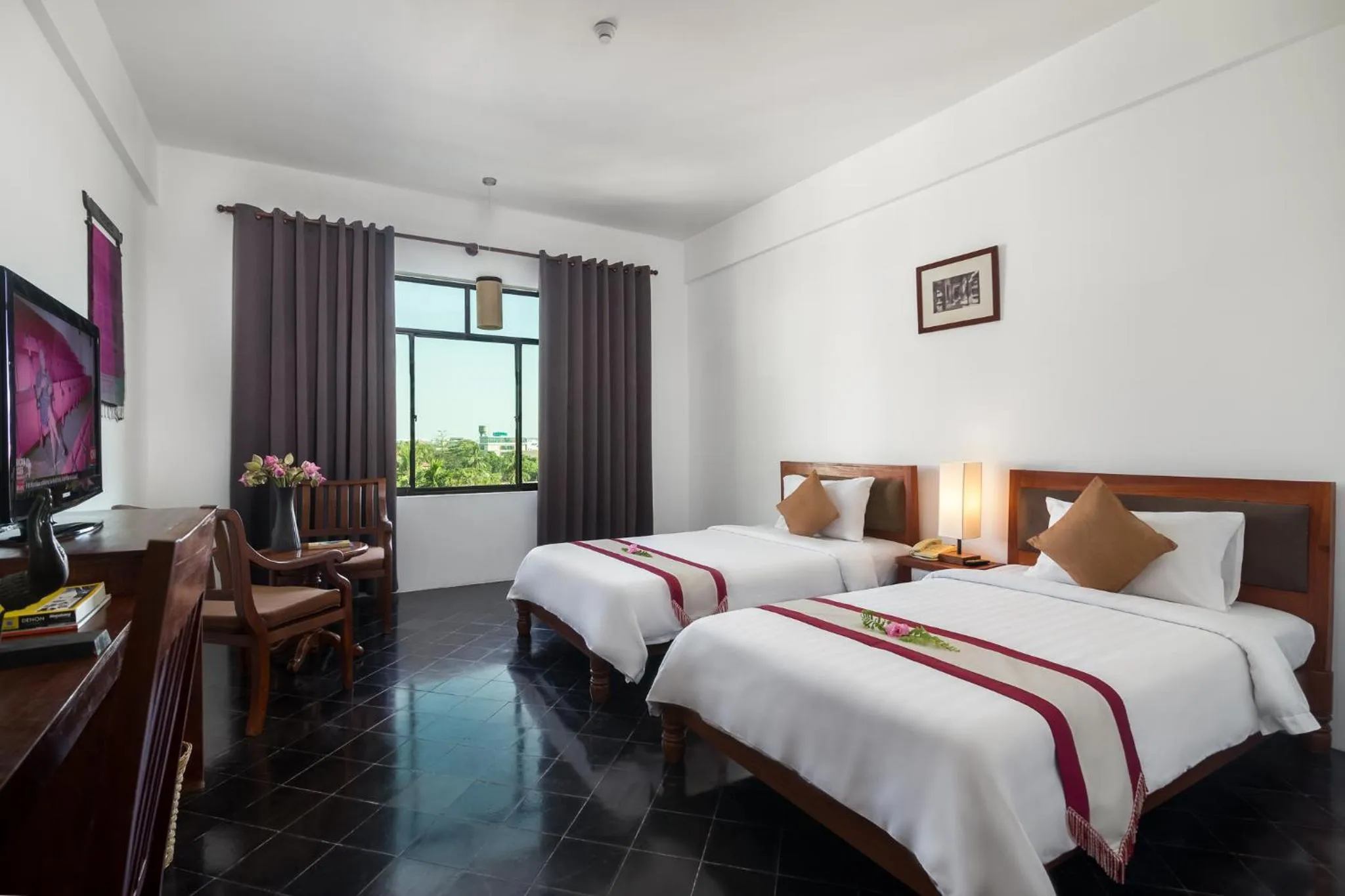 Photo of the whole room, Bed in Kingdom Angkor Hotel