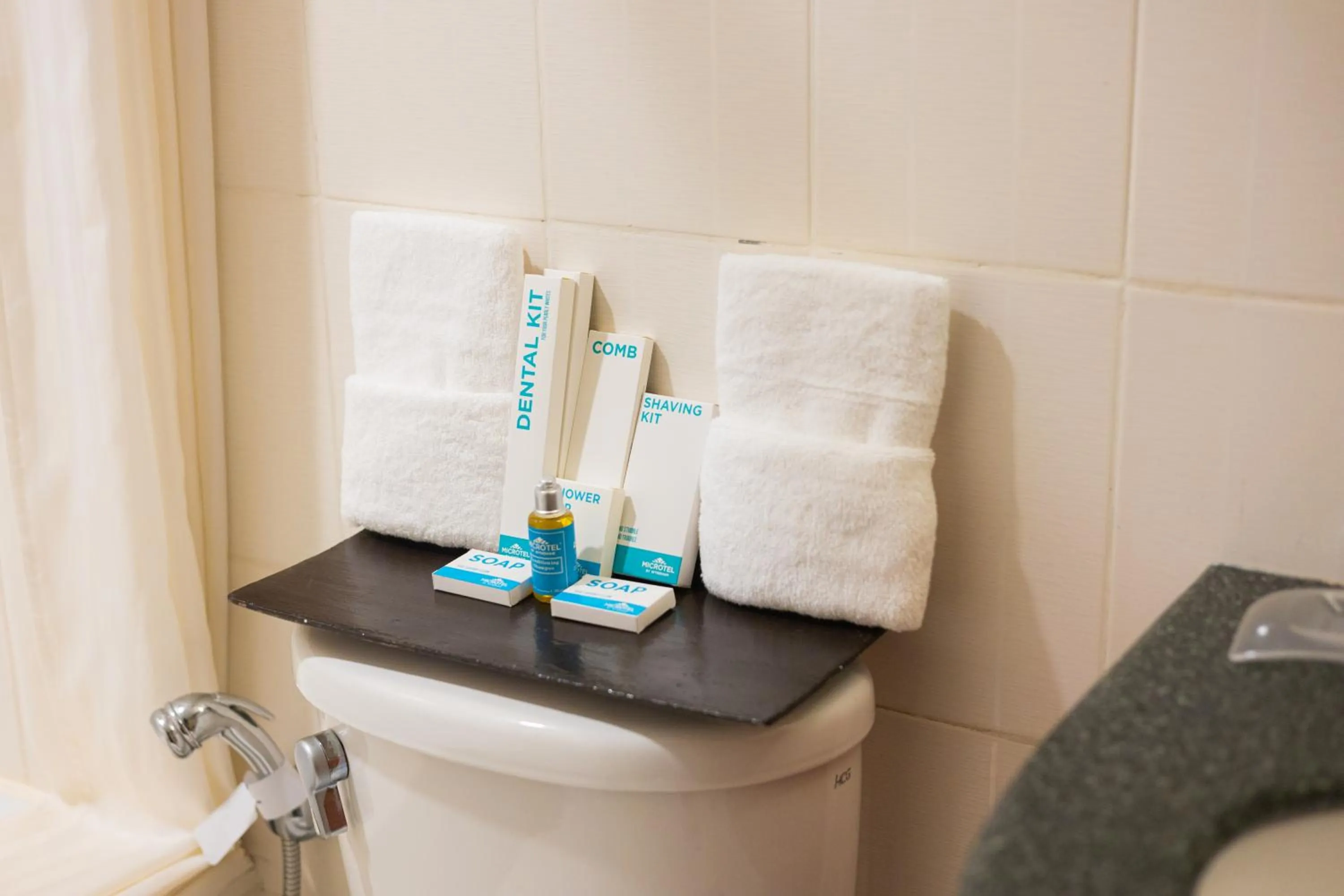 Bathroom in Microtel by Wyndham Cabanatuan