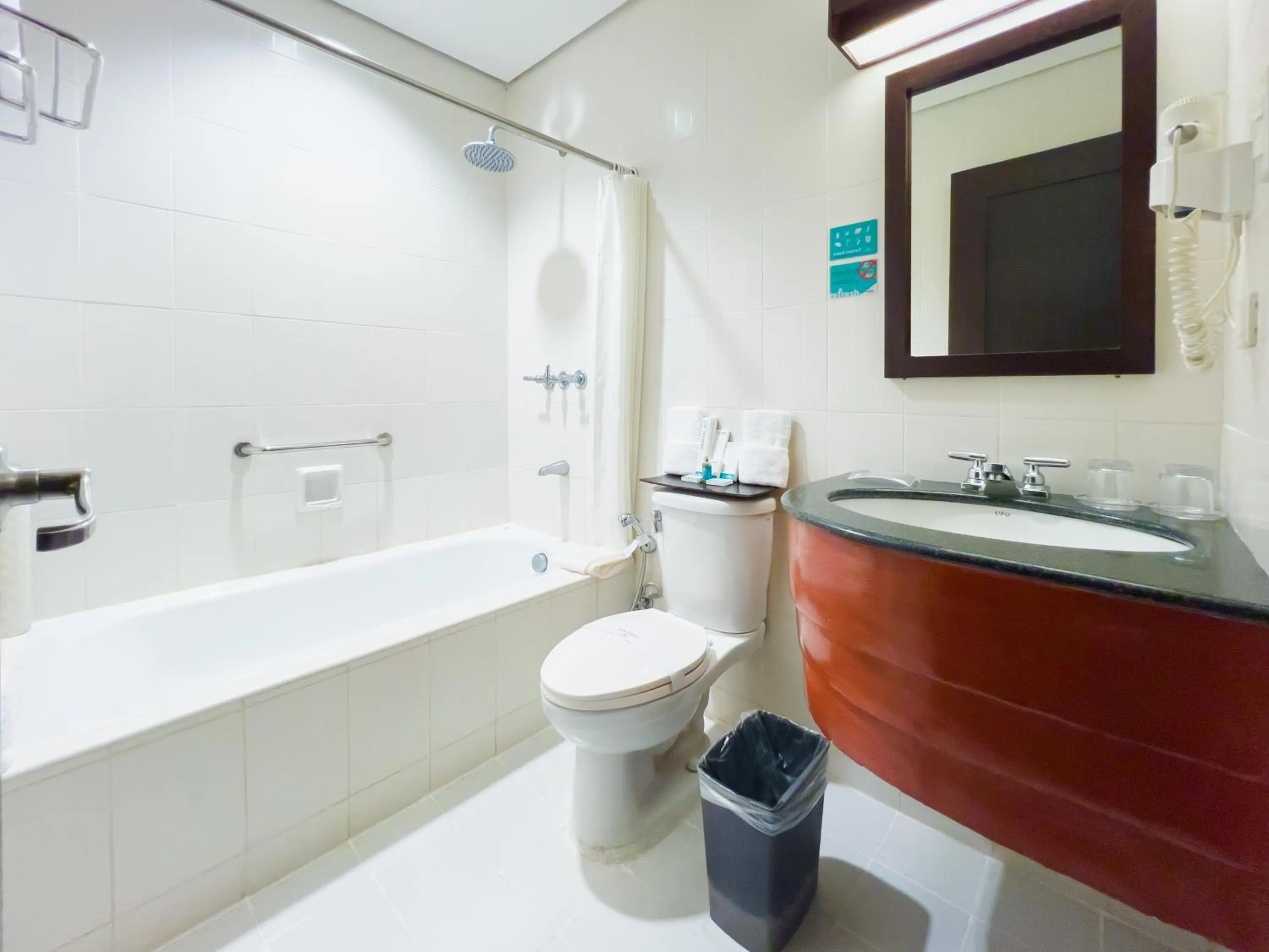 Bathroom in Microtel by Wyndham Cabanatuan