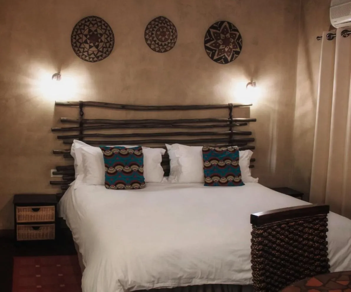 Bedroom, Bed in AmaZulu Lodge
