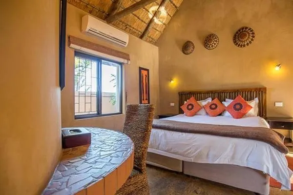 Photo of the whole room, Bed in AmaZulu Lodge
