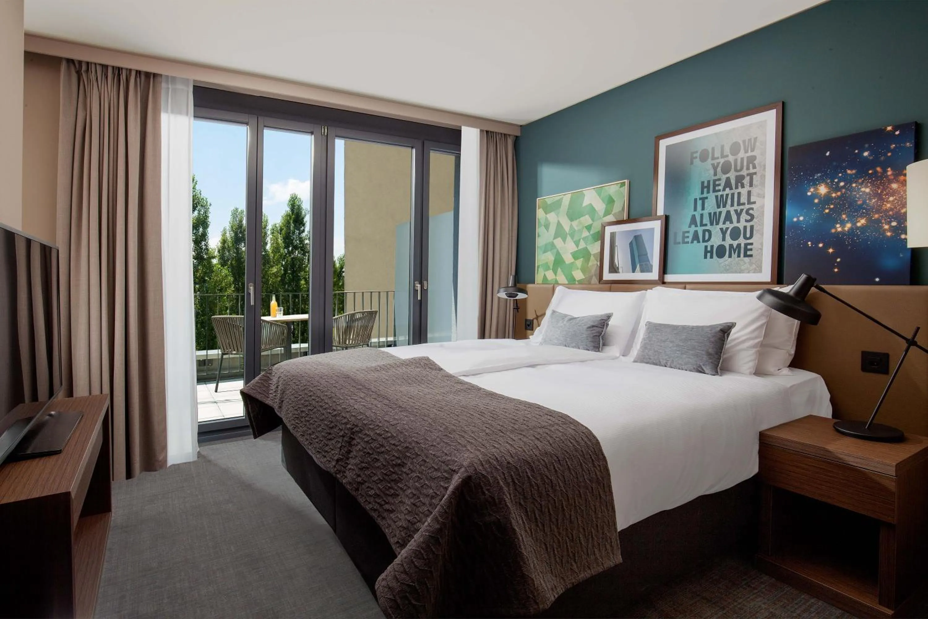 Bedroom, Bed in Acasa Suites Zurich Oerlikon