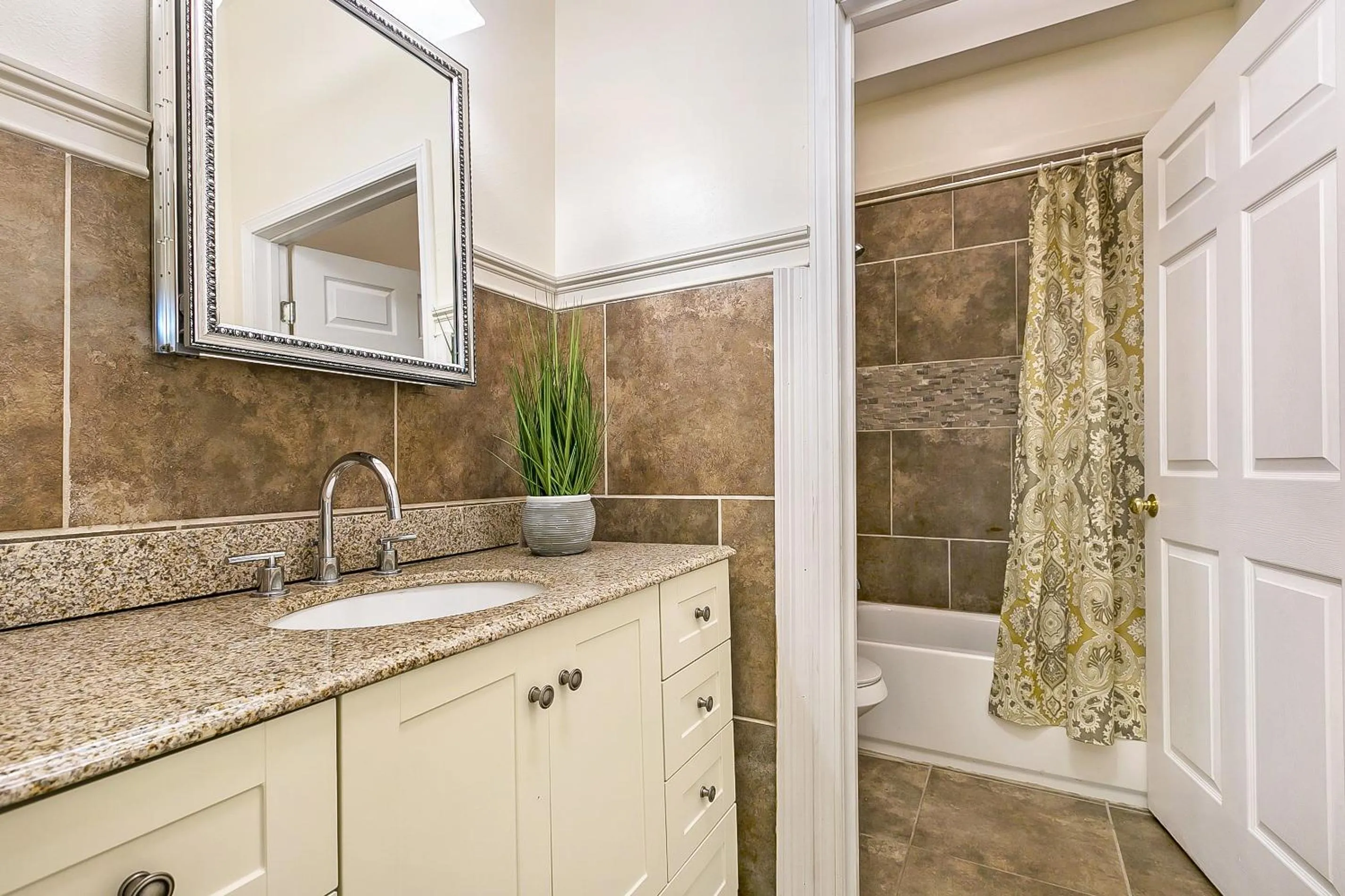 Bathroom in Urban Condos with Spacious Rooms & Amenities