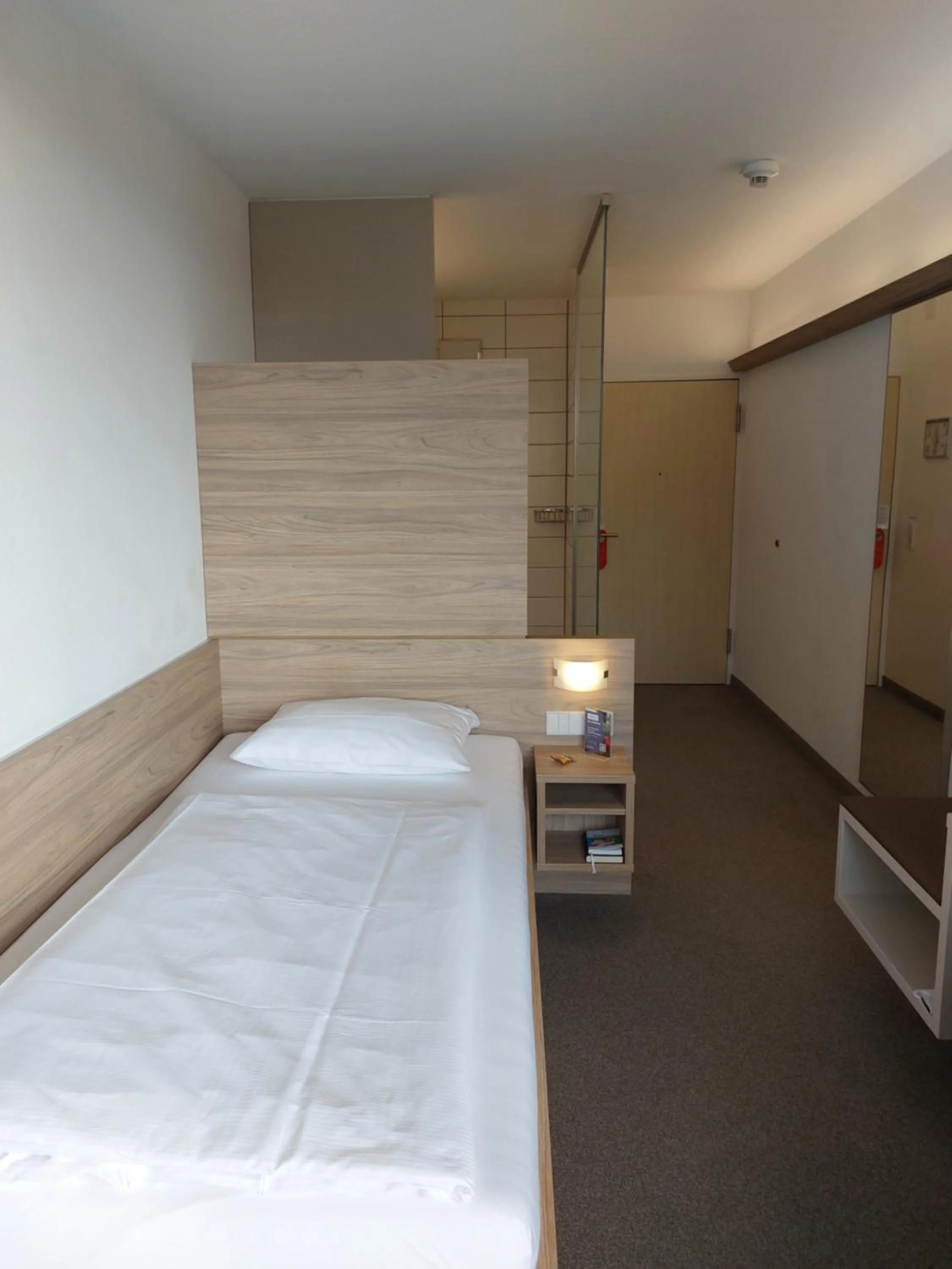 Photo of the whole room, Bed in Hotel am Schlossberg