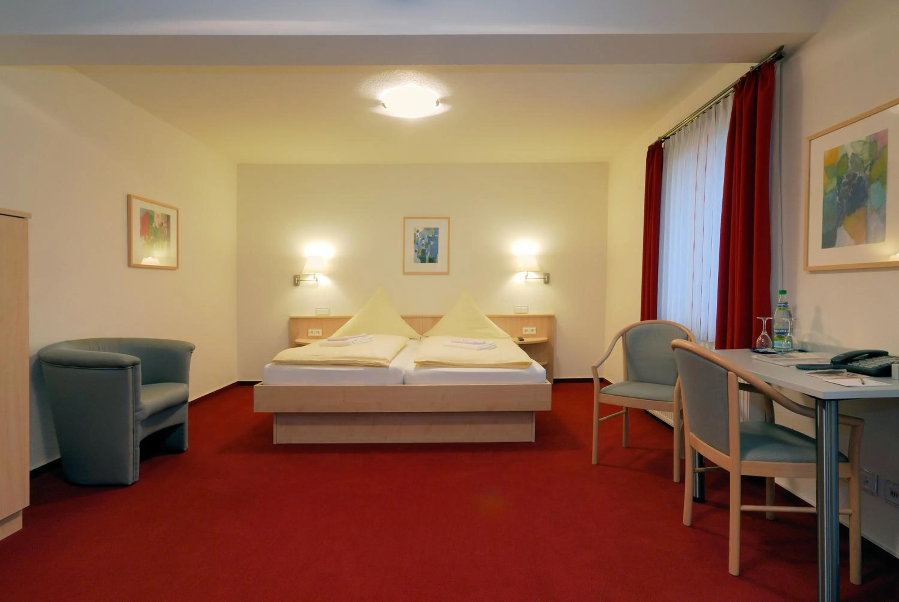 Photo of the whole room, Bed in Hotel am Schlossberg