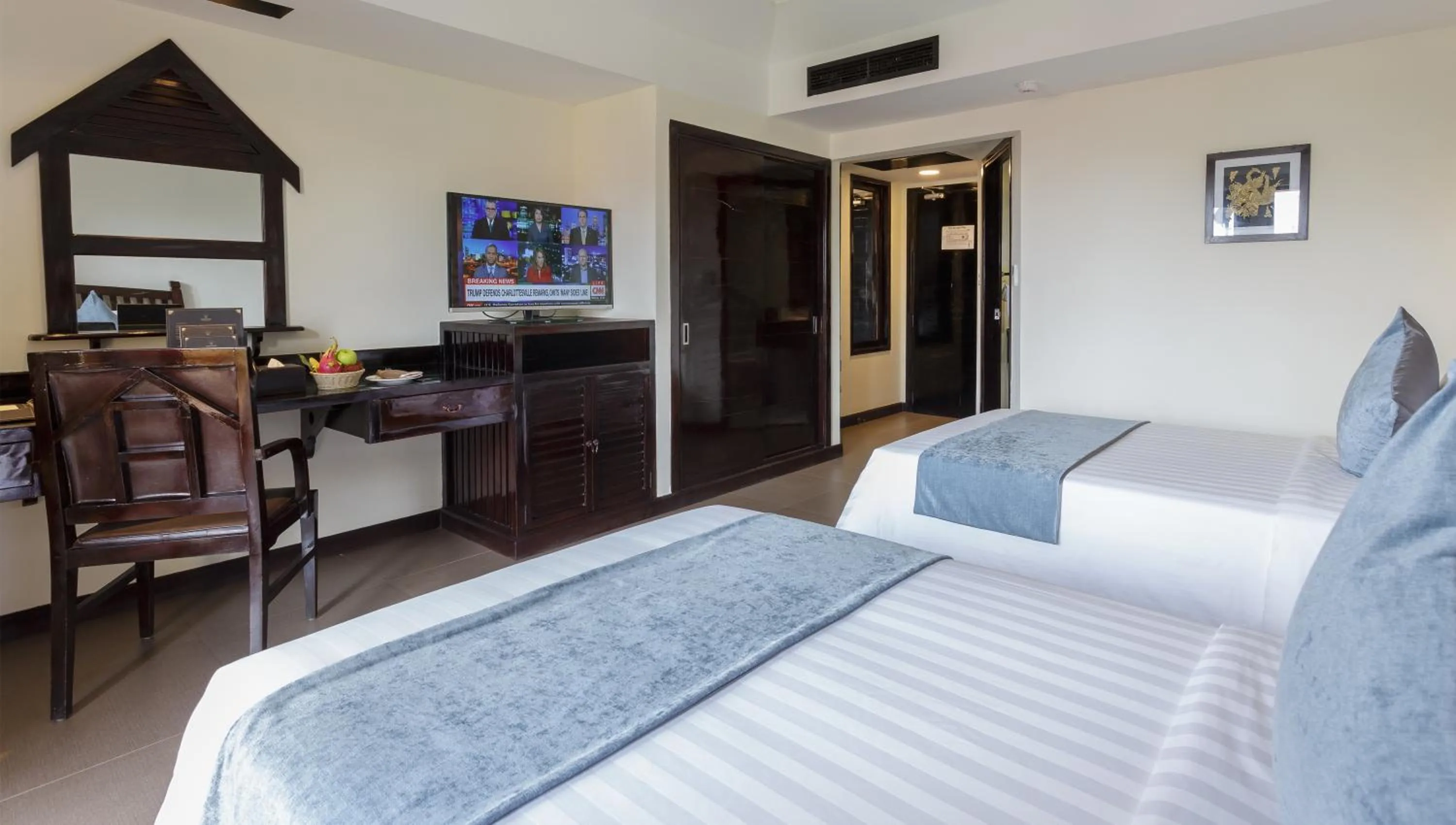 Communal lounge/ TV room, Bed in Sokchea Angkor Hotel